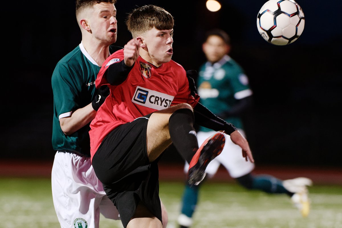 Union defender Josh Shelley challenges for the ball