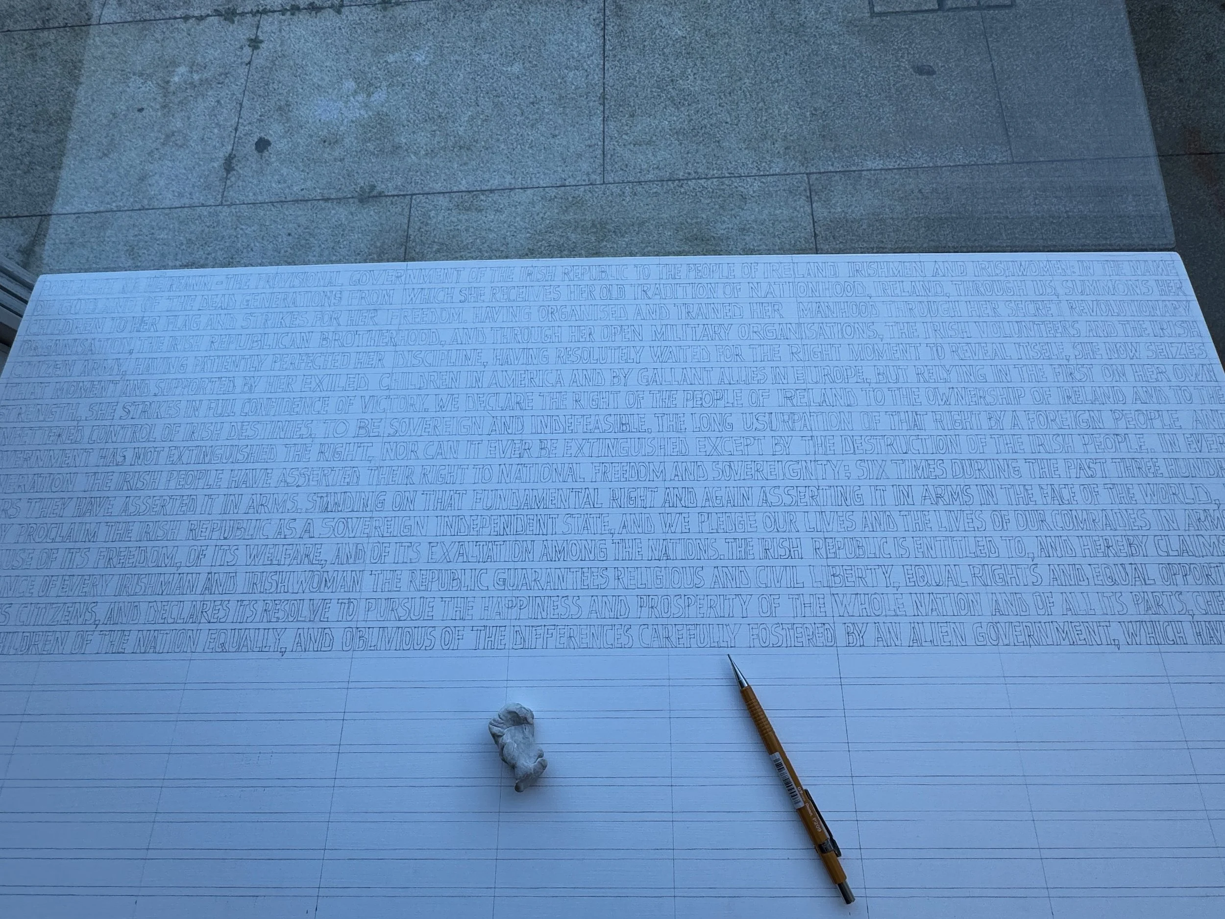 Half way through laying out the Irish Proclamation onto the White painted Aluminium.jpeg