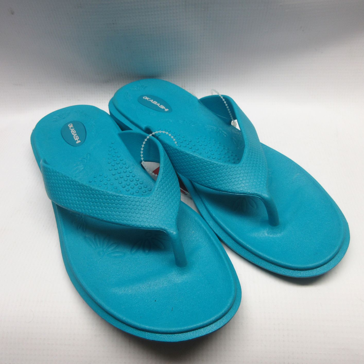 teal flip flops