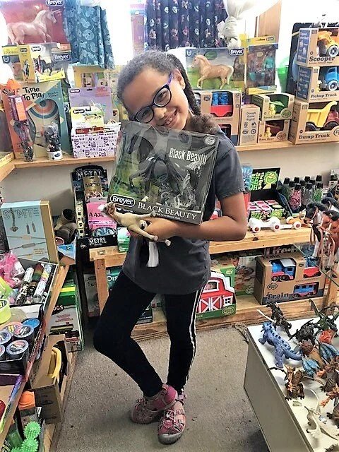 Ariana in toy department at cabaline..jpg