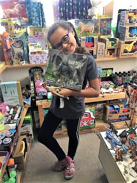 Ariana in toy department at cabaline..jpg