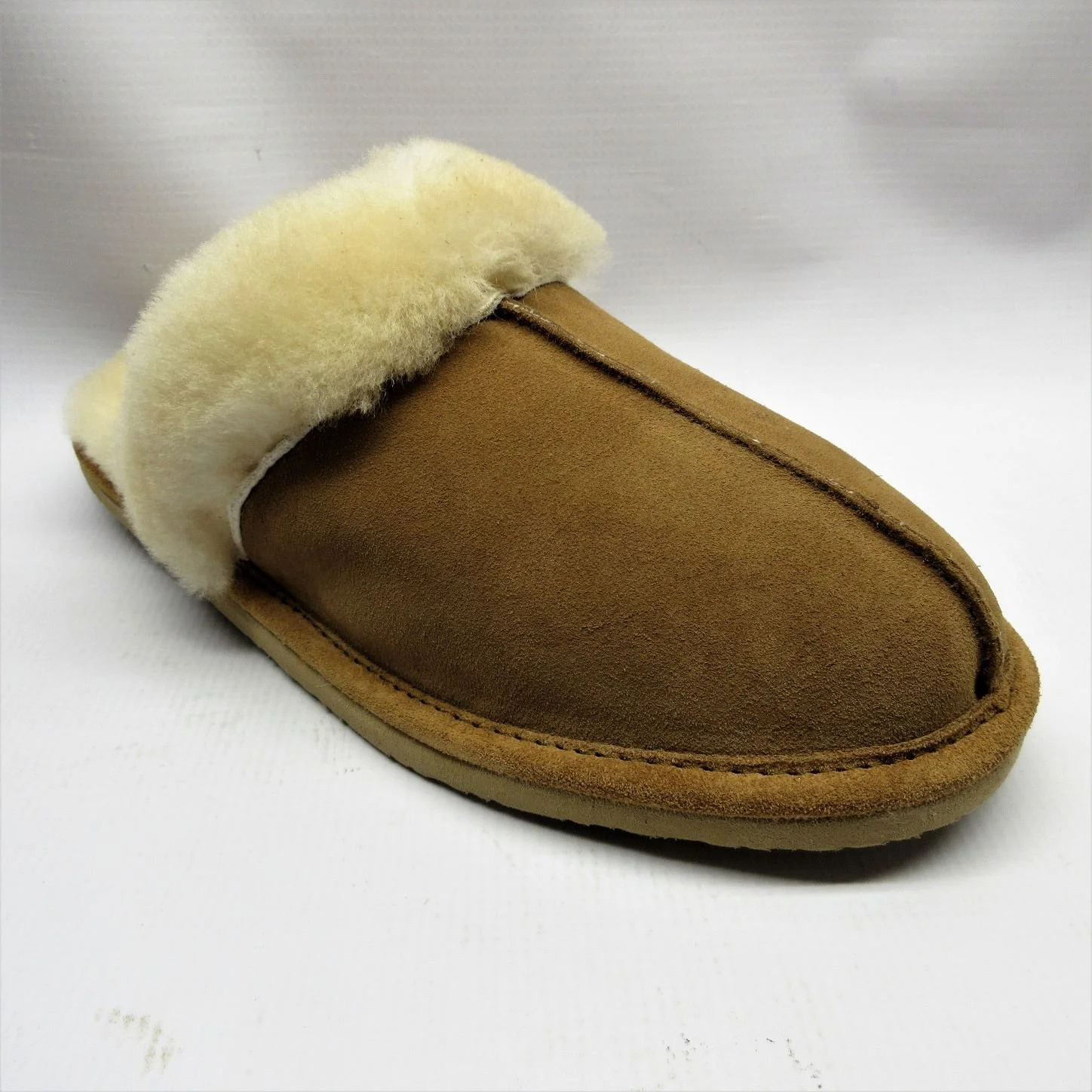 Minnetonka Slippers Women Sheepskin Slide in Tan.JPG