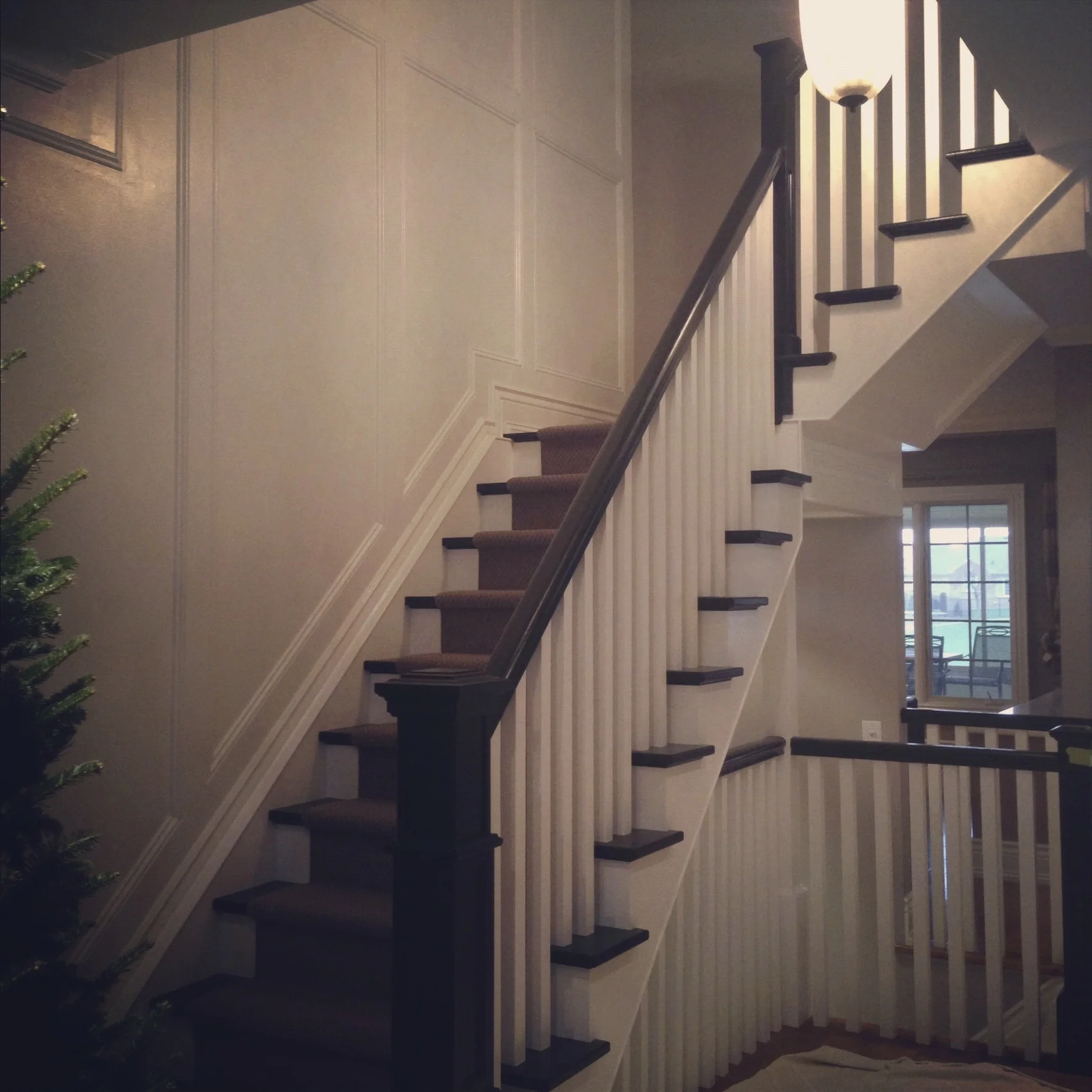 Staircases and Faux panel walls are the focal point of this Burlington home. 