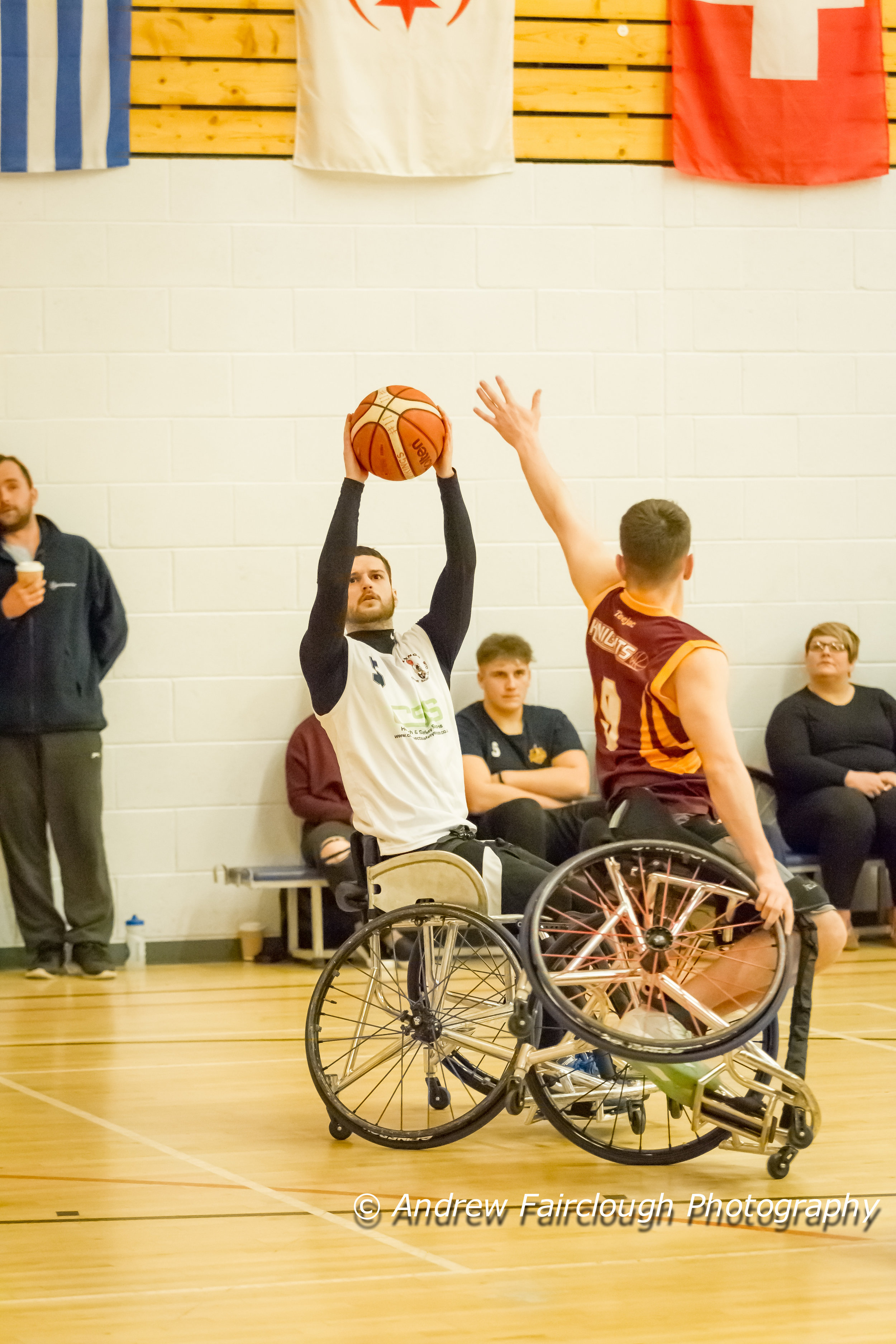 classic wheelchair basketball action , block attempt on one wheel ( Vikings v's Knights March 2017)