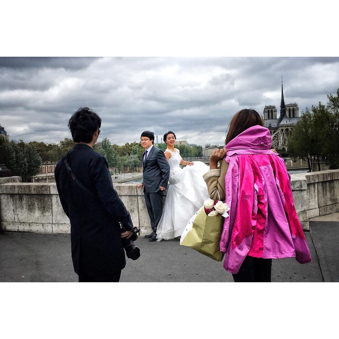 Picture of #photographer who takes a #picture 2 
#paris #notredame #eiffeltower #pink #wedding #tourist #cloudy #cloudysky #seineriver #bridge #seine