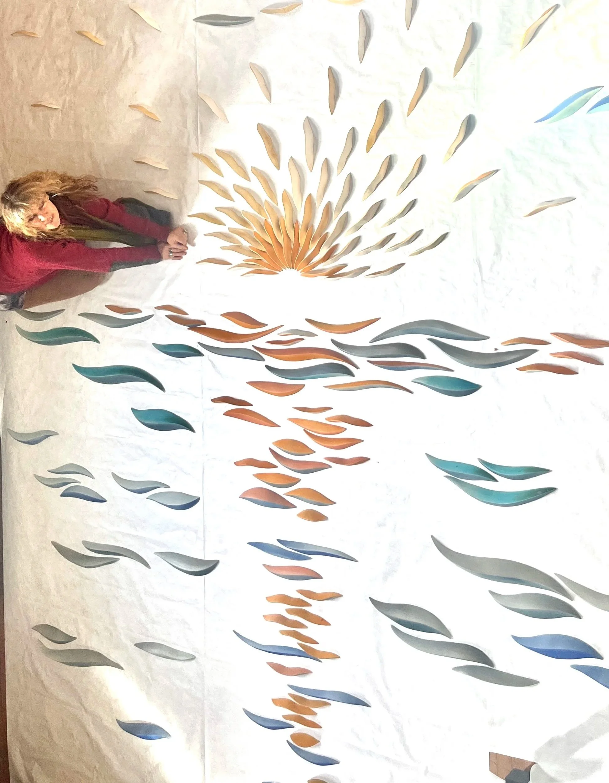natalie+working+on+Large+Lake+Sunset+wall+for+hospital+in+Illinois.jpg