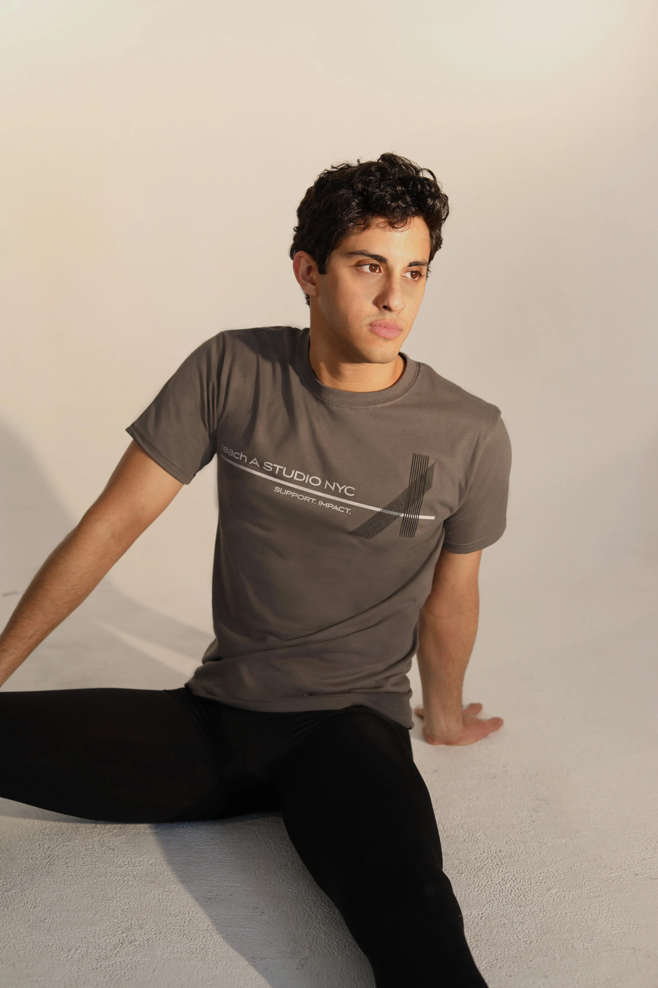 reach A STUDIO T-shirt
