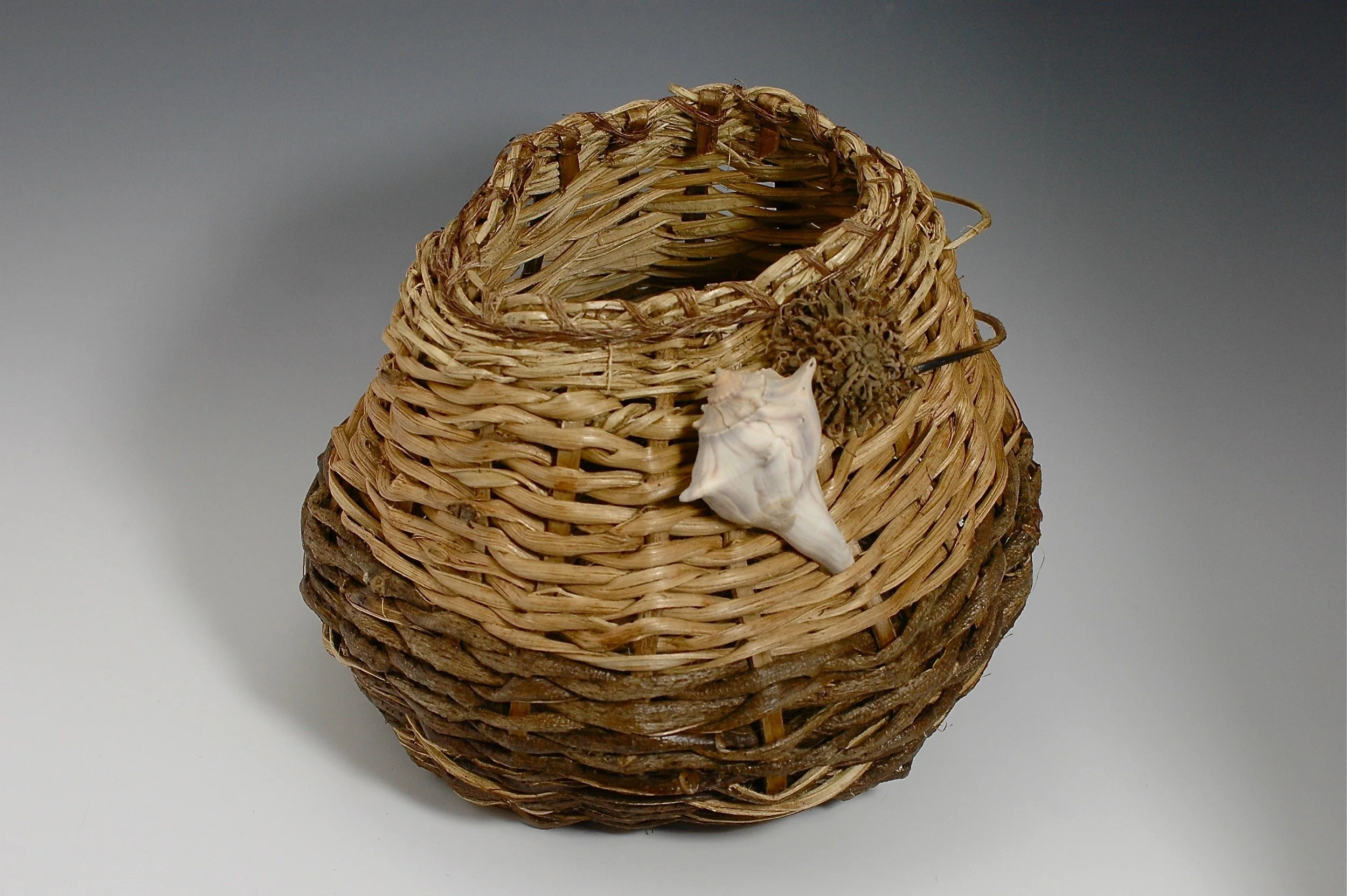 medium sculptural with shell and natural accent.jpg