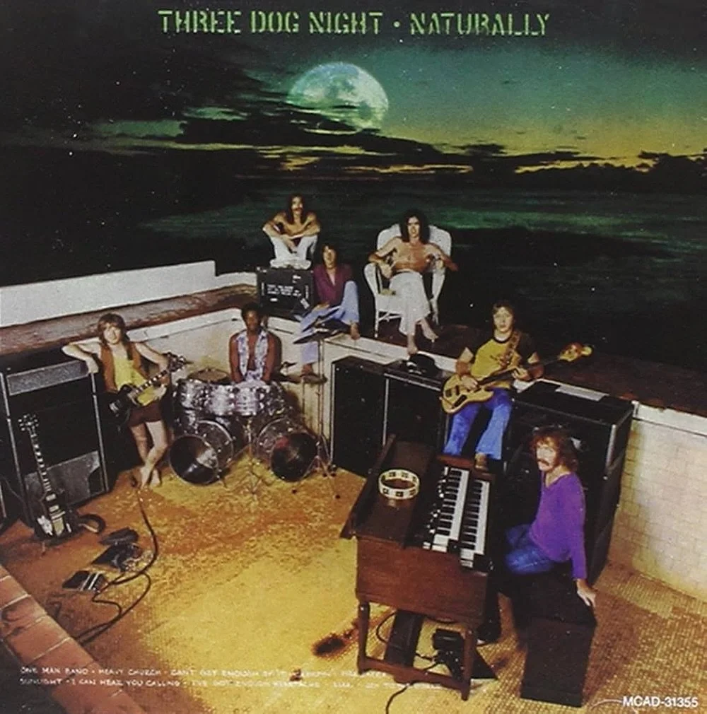 ON THIS DAY in 1970, Three Dog Night released &ldquo;Naturally.&rdquo; This album went on to be RIAA Certified Gold, including the hit songs &ldquo;Liar&rdquo; and &ldquo;Joy to The World,&rdquo; both which are staples of their set list to this day!
