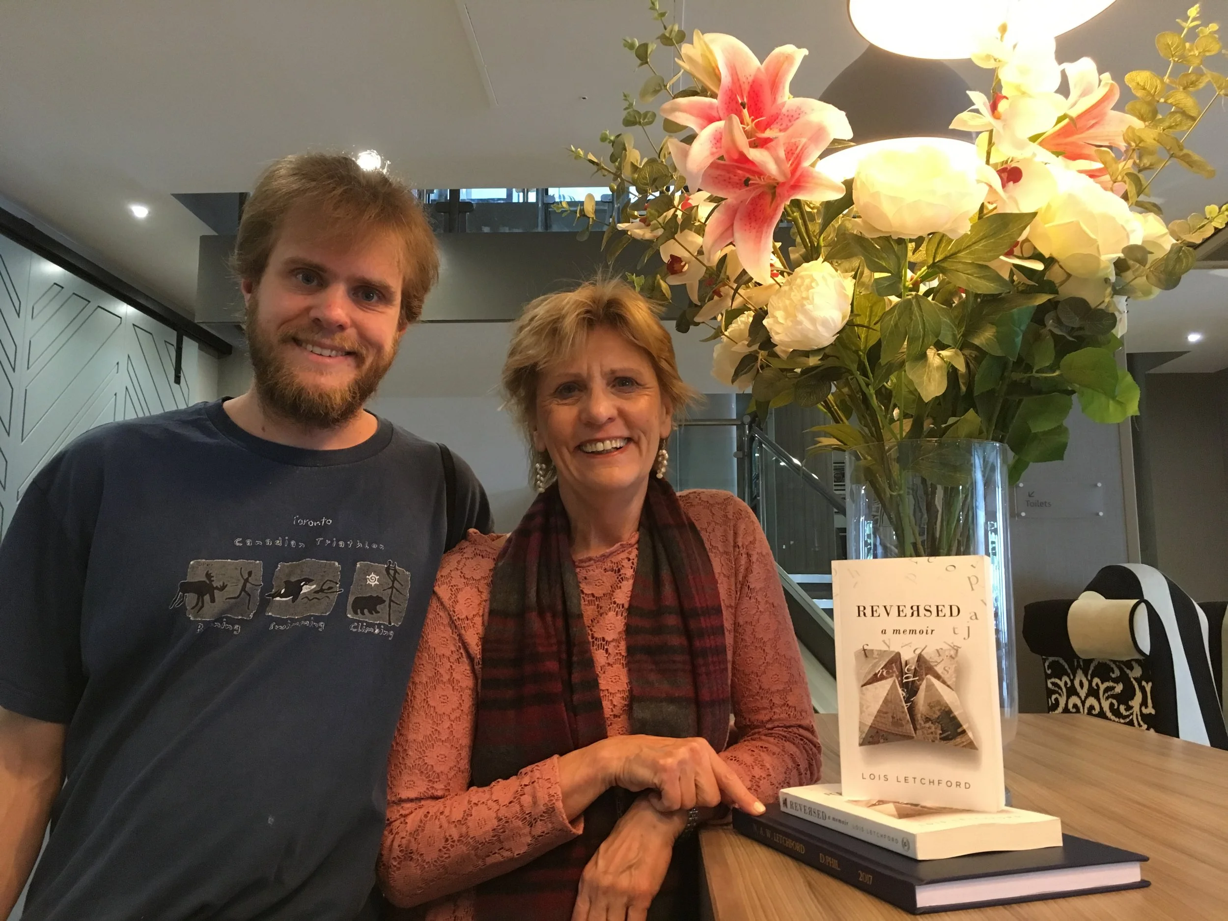 Nicholas and me with my book and his dissertation.