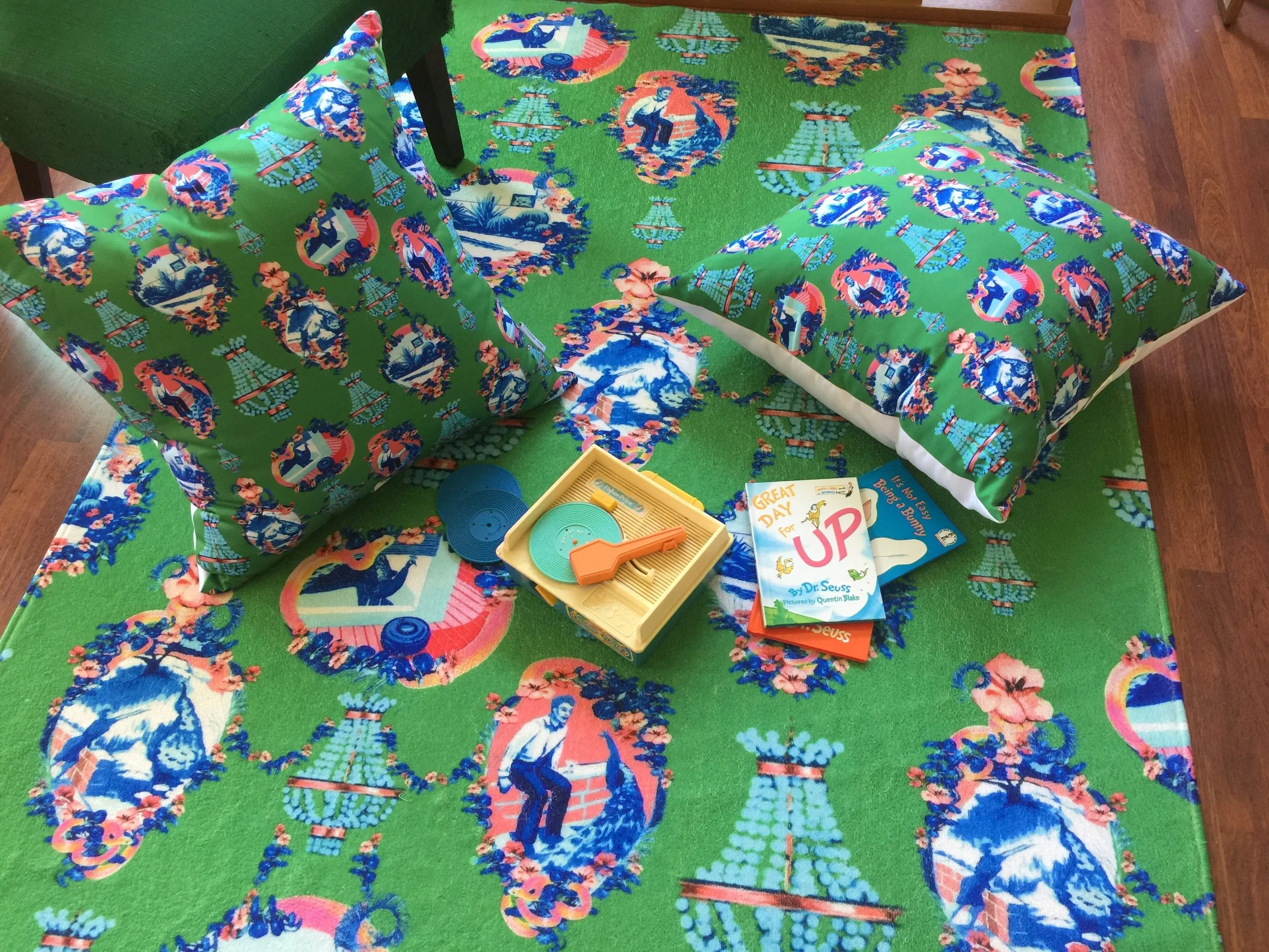 Rug and pillows in toile