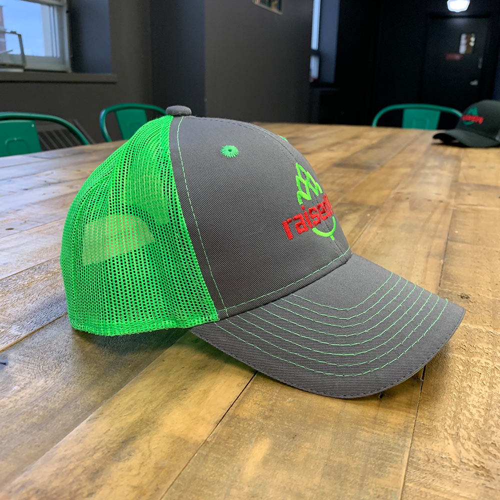 raised14_green_cap_2.png