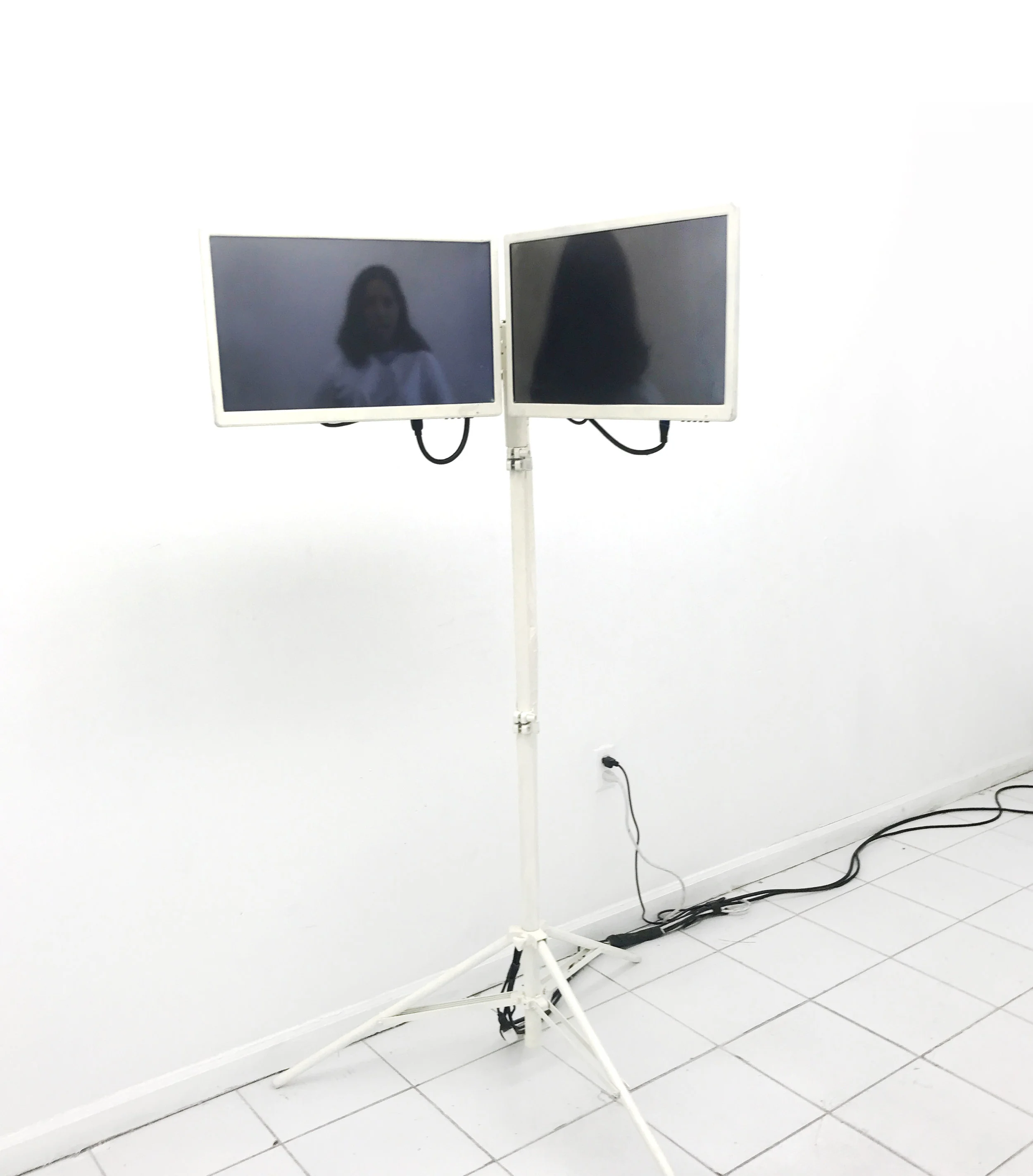 Sean Donovan, Richard Vivenzio Hello Goodbye, 2017 monitors, video loop, tripod 56 x 32 inches (142 x 81 cm)