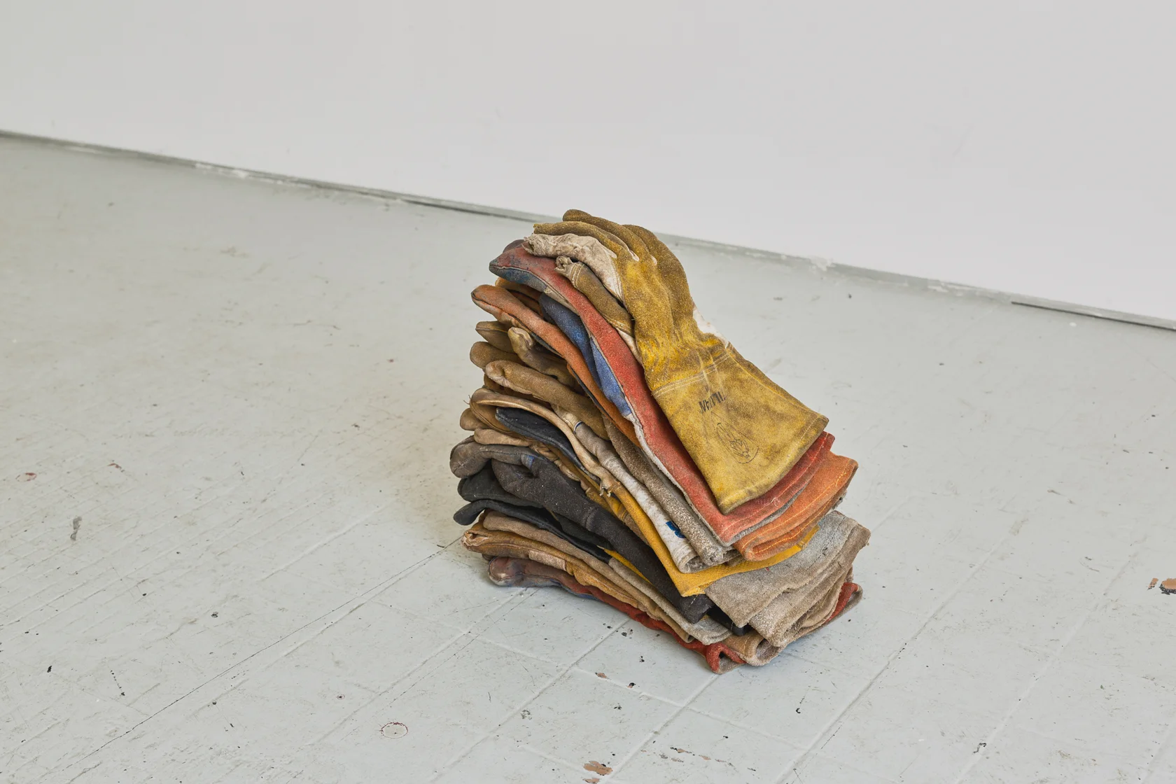 Brian Dario Foam, 2018 18 unpaired gloves 18 x 6 x 9 inches (46 x 15 x 23 cm) (BD1) installation view Stereo, Warsaw