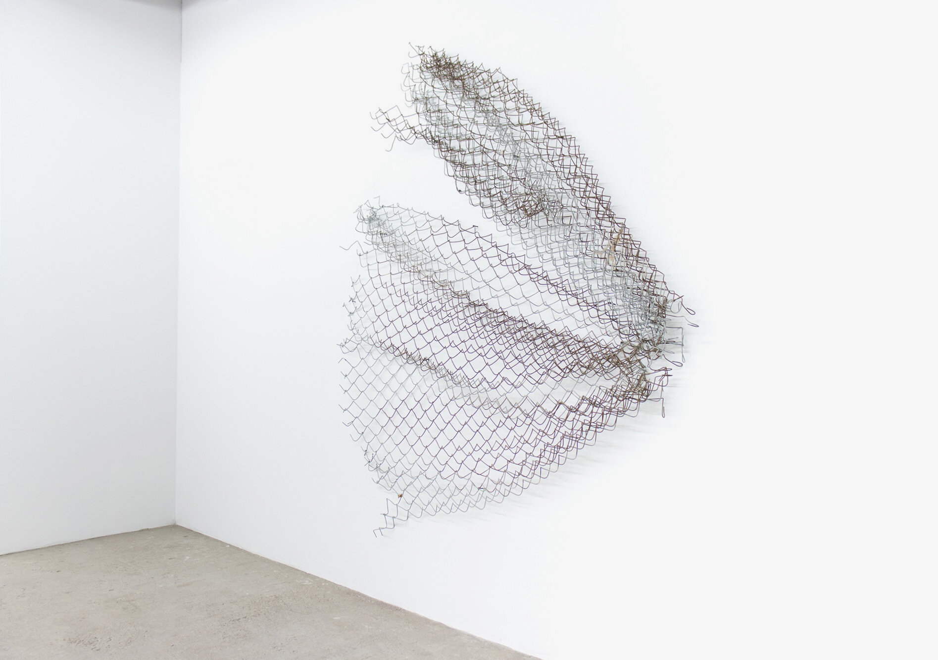  Sean Donovan  Untitled , 2018 acid soaked galvanized chain-link fencing, screws 83 x 72 x 9 inches (211 x 183 x 23 cm) (SD46) 