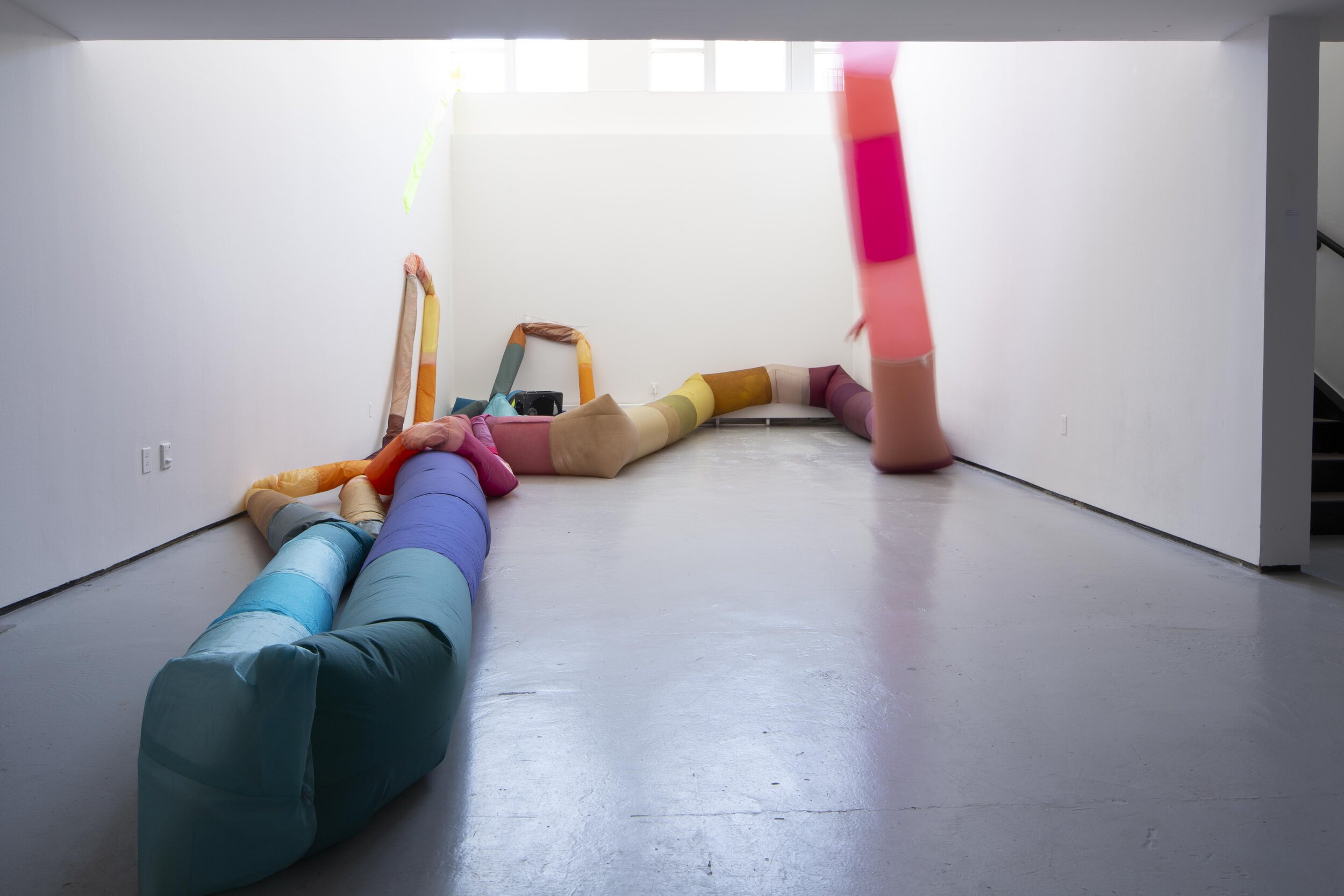  Peyton Peyton  Labber Rinse Repeat , 2020 thread, acid-dyed nylon, plastic tarp, zippers, elastic, velcro, staples,  clear vinyl, air blowers, interval timers, decoy duck butts, cushion dimensions variable to installation photo by Sol Avi Erez 