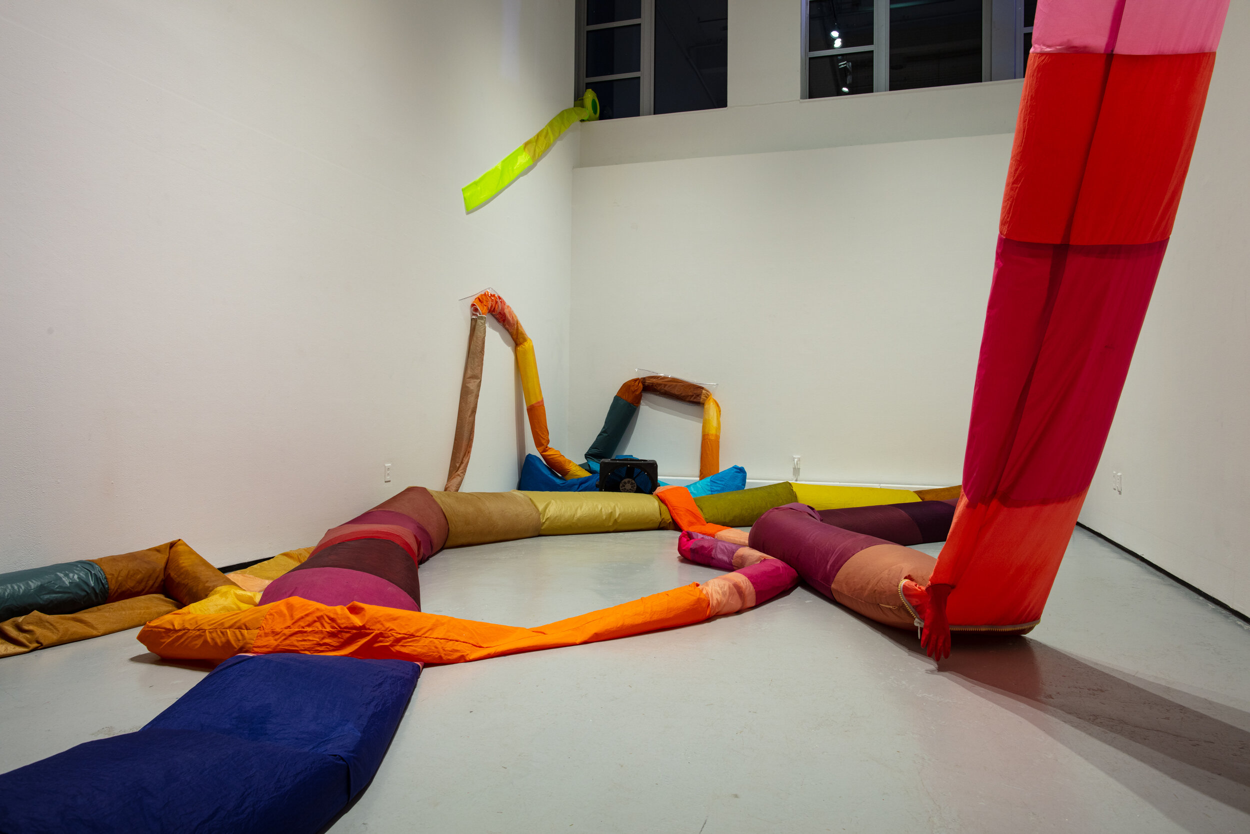  Peyton Peyton  Labber Rinse Repeat , 2020 thread, acid-dyed nylon, plastic tarp, zippers, elastic, velcro, staples,  clear vinyl, air blowers, interval timers, decoy duck butts, cushion dimensions variable to installation photo by Ronghui Chen 