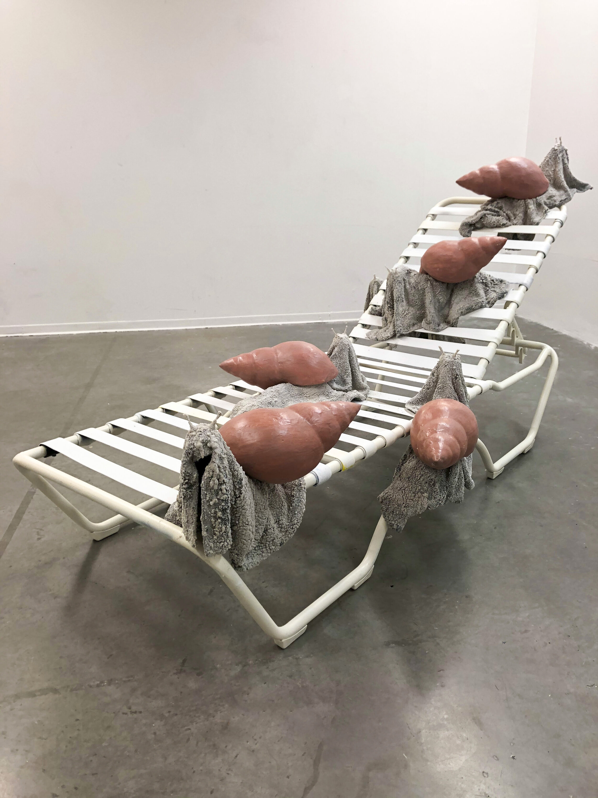  Alex Zak  Ship of Fools , 2020 Modified lounge chair, towels, pearl sewing needles, sand, epoxy resin, foam, paint 54 x 108 x 48 inches (137 x 274 x 122 cm)   