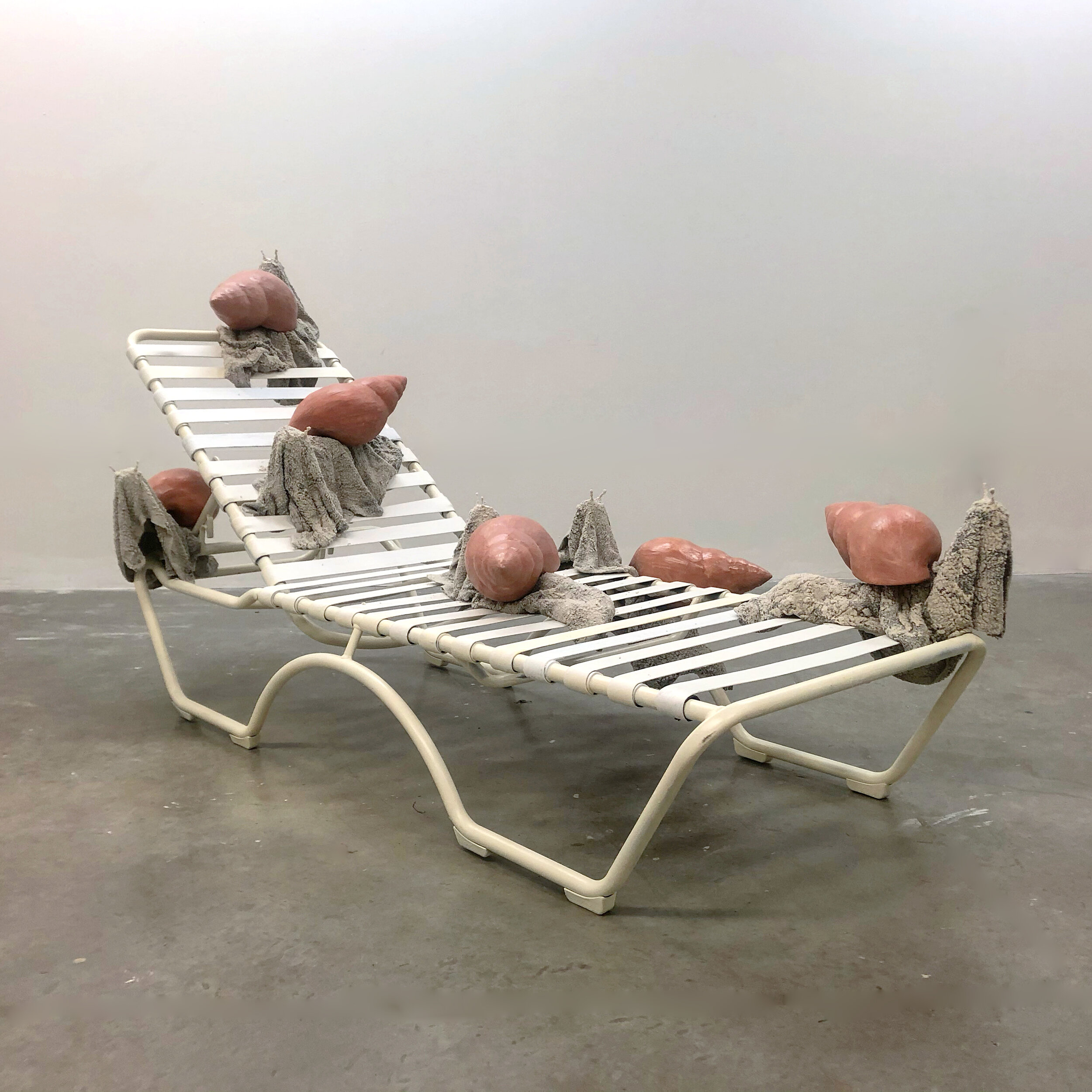  Alex Zak  Ship of Fools , 2020 Modified lounge chair, towels, pearl sewing needles, sand, epoxy resin, foam, paint 54 x 108 x 48 inches (137 x 274 x 122 cm) 