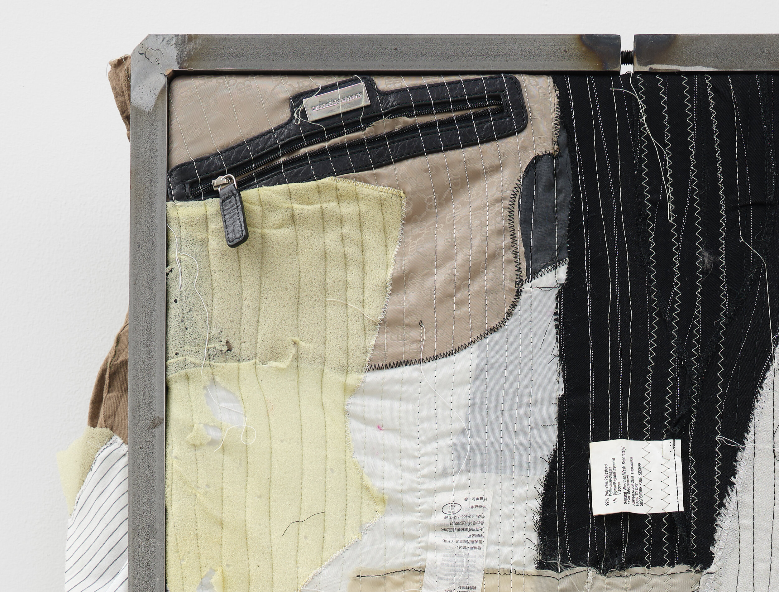  Tenant of Culture  Grip and Stitch , 2020 (detail) Steel, recycled hand bag linings, miscellaneous recycled garment pieces, thread, padding  29 x 21.5 x 5 in (74 x 54 x 12 cm) 