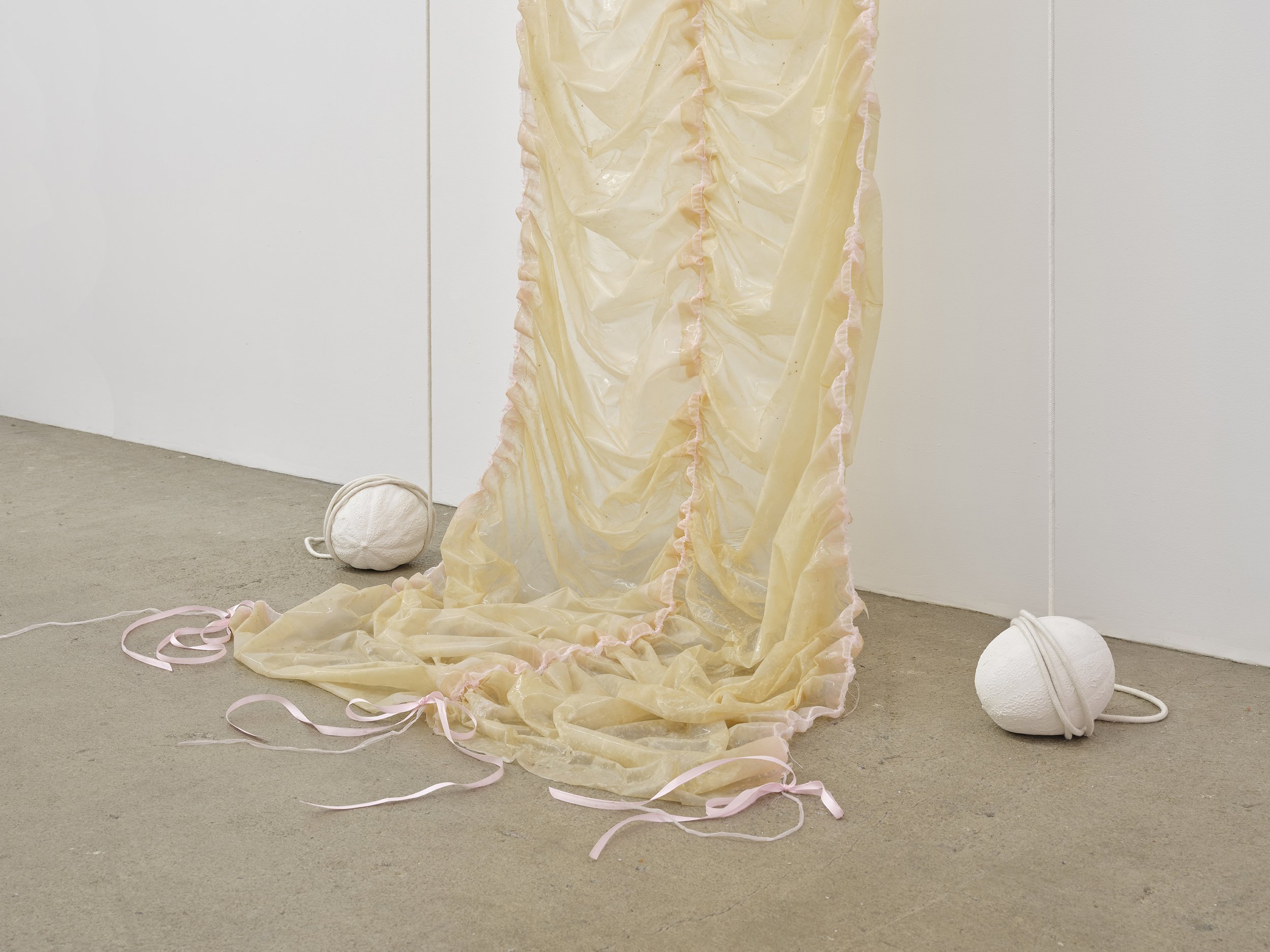  Karinne Smith  Untitled (piece of Pinkie II) , 2021 (detail) collagen dyed with soda, silicone, baby powder, ribbon,  scrotum clamps, cotton rope, cast plaster melons 124 x 52 x 36 inches (310 x 132 x 91 cm) (KS1) 