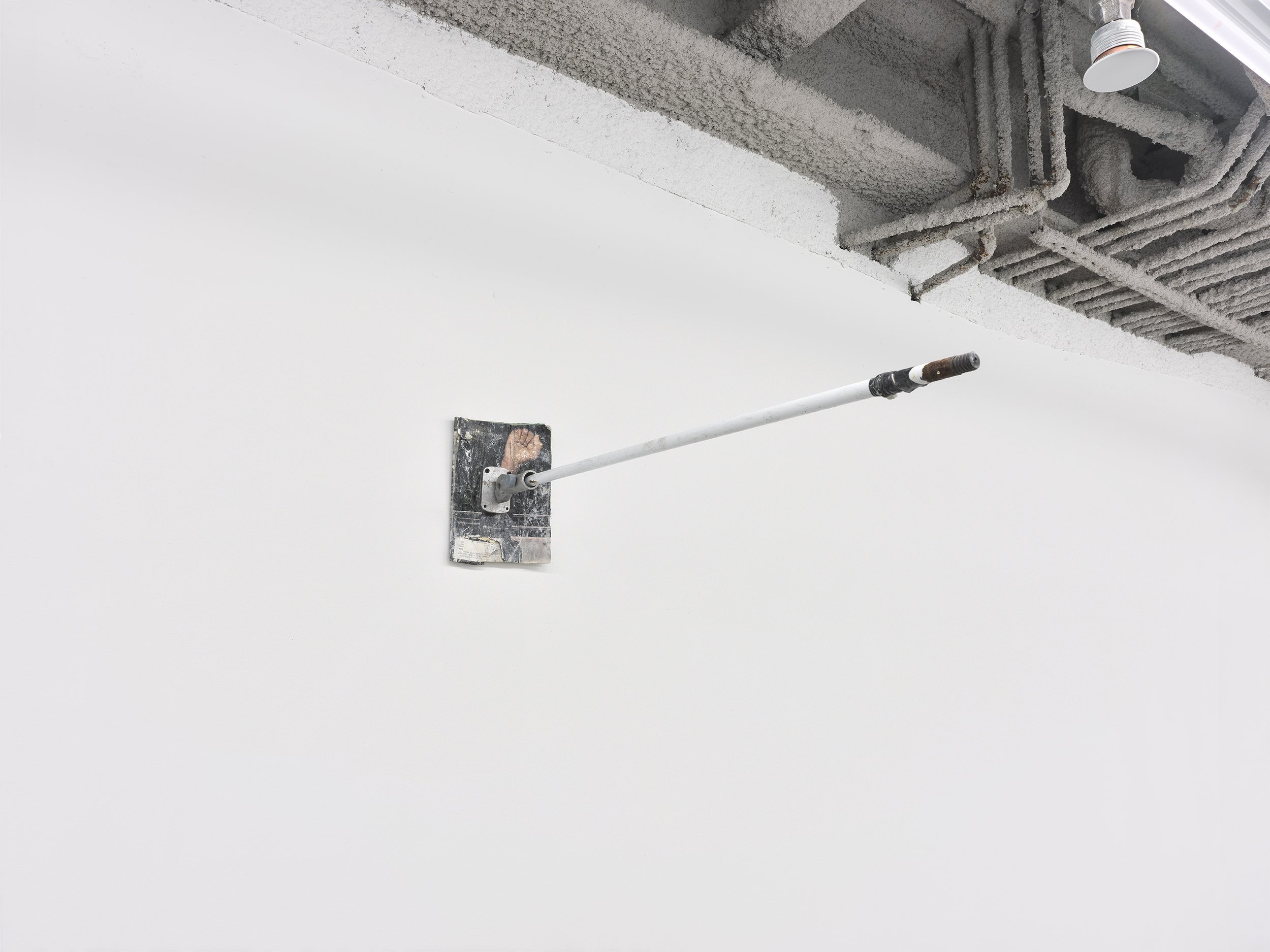  Elzie Williams III  Untitled , 2020 magazine, flagpole bracket, broomstick, acrylic  8 x 44 inches (20 x 112 cm) (EW2) 