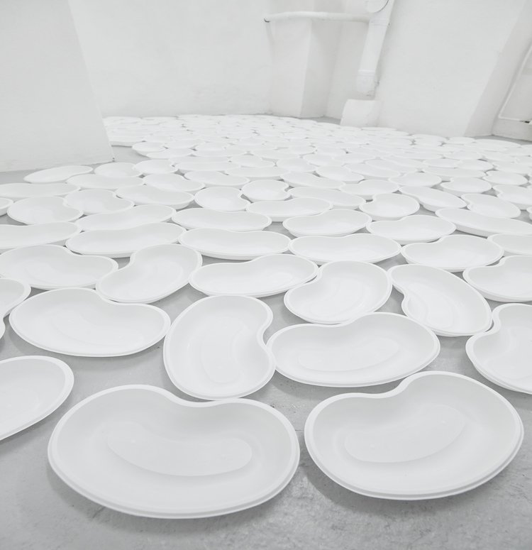  Bat-Ami Rivlin  Untitled (500 bedpans) , 2021 500 bedpans dimensions variable Installation view from the two artist exhibition  Excess and Surplus  with Anna Holtz Sharp Projects, Copenhagen  on view 06 August - 10 September 2021 