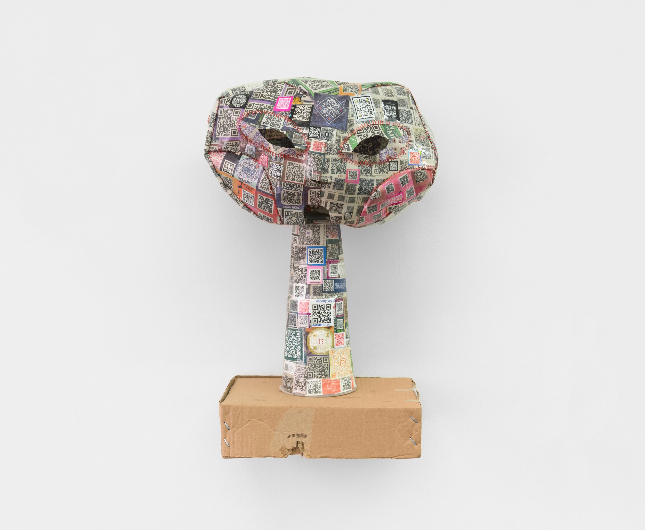  Elzie Williams III  Denso-Tron (Prototype) , 2023 found QR codes, clear tape, thread, wire mesh, epoxy, cardboard box  23 x 12 x 8.5 inches (58 x 31 x 22 cm) EW12 