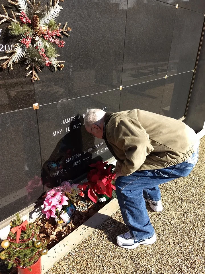 Senior home care client visiting deceased spouse's grave