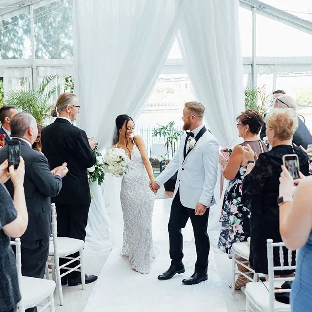 That moment when the I do's are said and the party begins! Congratulations to our beautiful couple Stephen and Mandi!
.
.
.
.
🌼 @brisbanemarketflowers 📸 @tempusmediaco 
@customshousebne
.
.
.
.
.
#eventdesign #floralinstallation #weddingideas #even