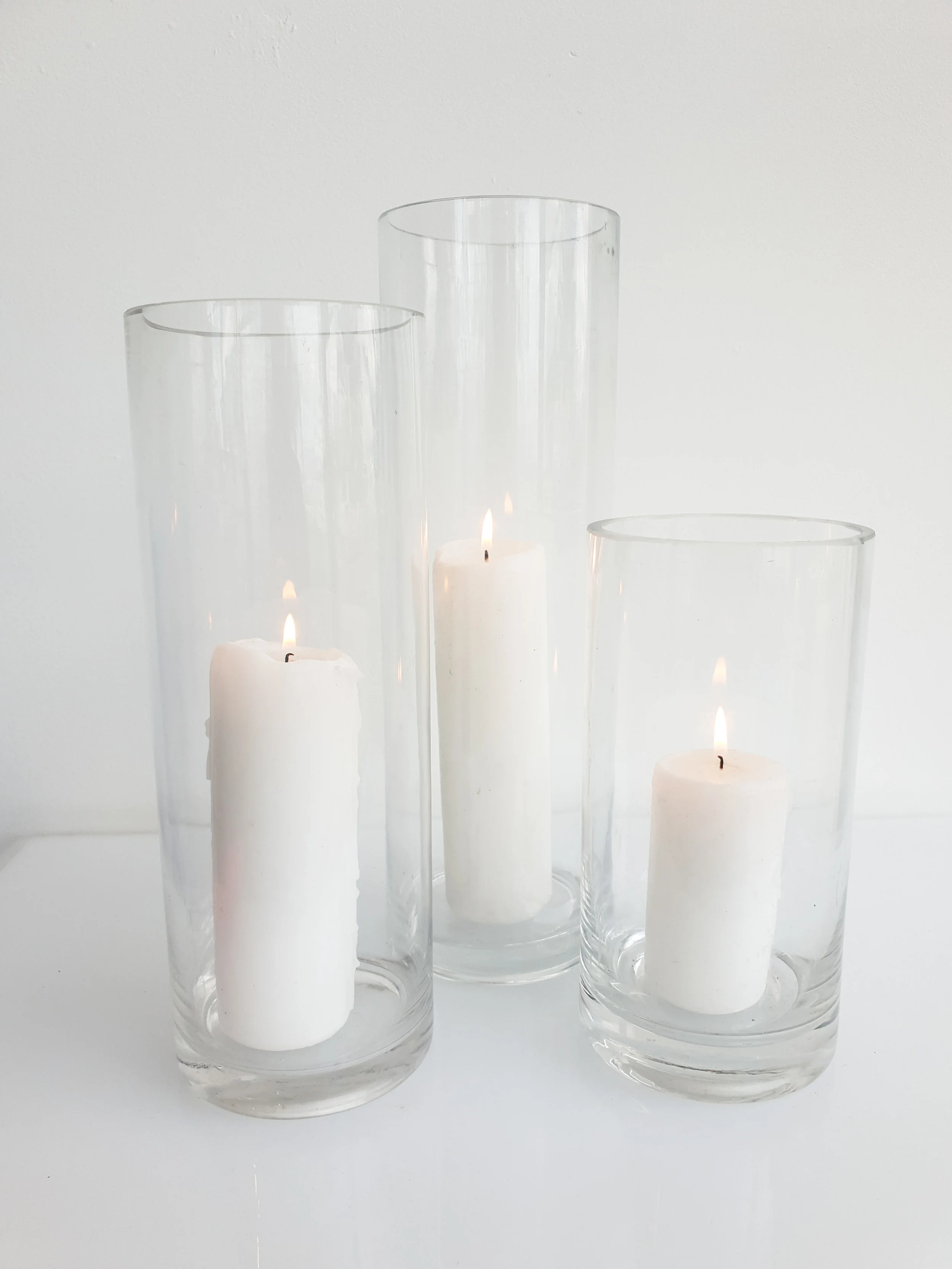 GLASS CYLINDER VASE WITH PILLAR CANDLE 20 CM H $10+GST 25 CM H $10+GST 30 CM H $12+GST 40 CM H $14+GST