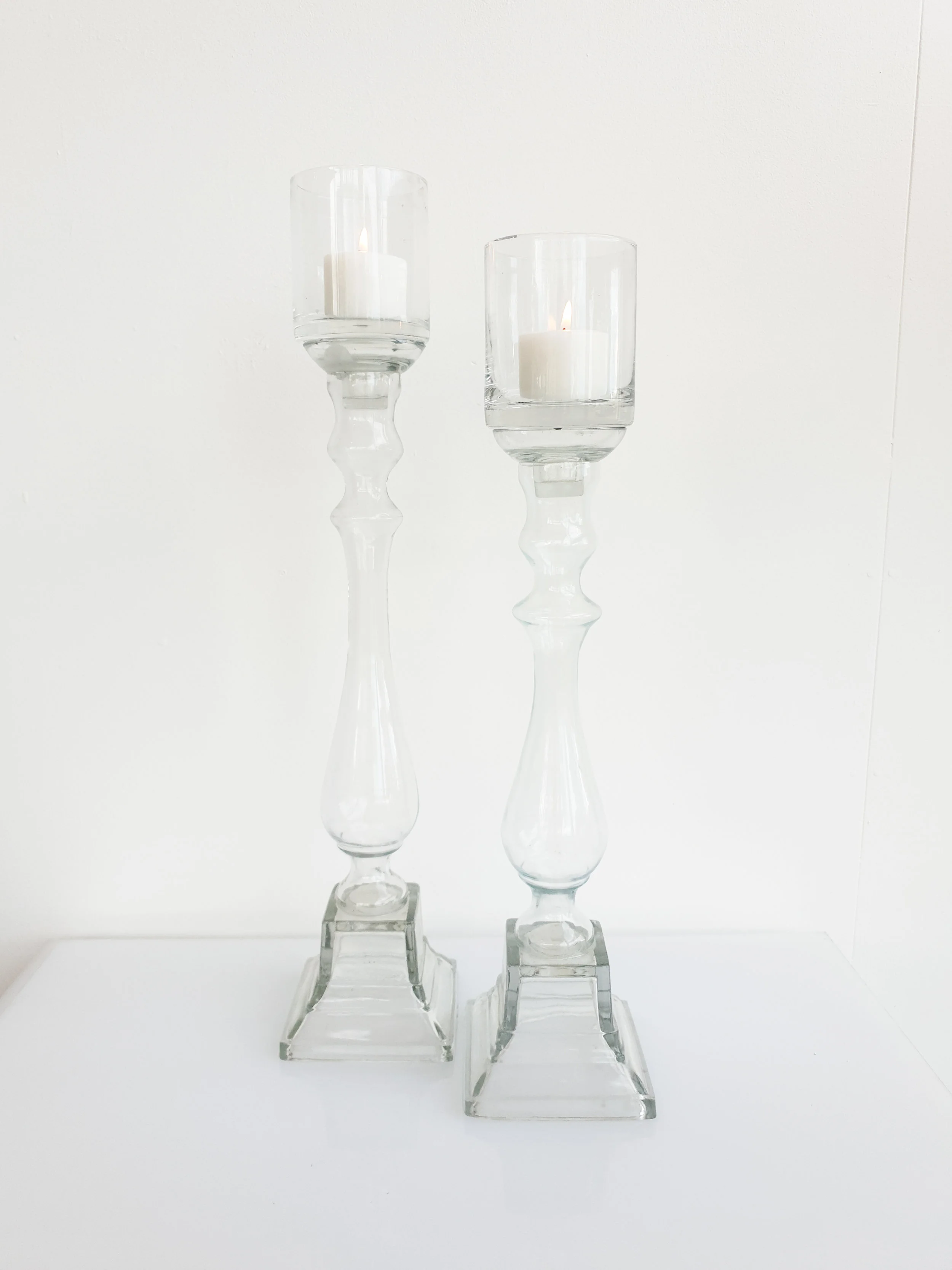 GLASS CANDLESTICKS SMALL $10+GST TALL $12+GST