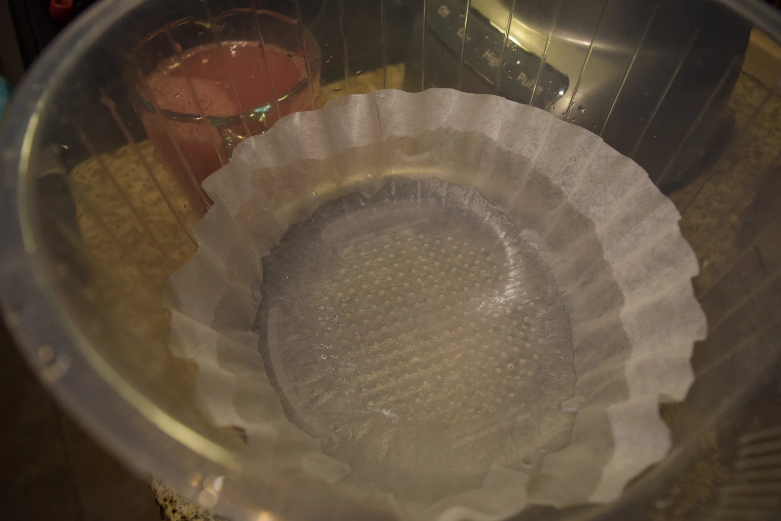 Tried to use to use a rice-washing bowl lined with a coffee filter instead