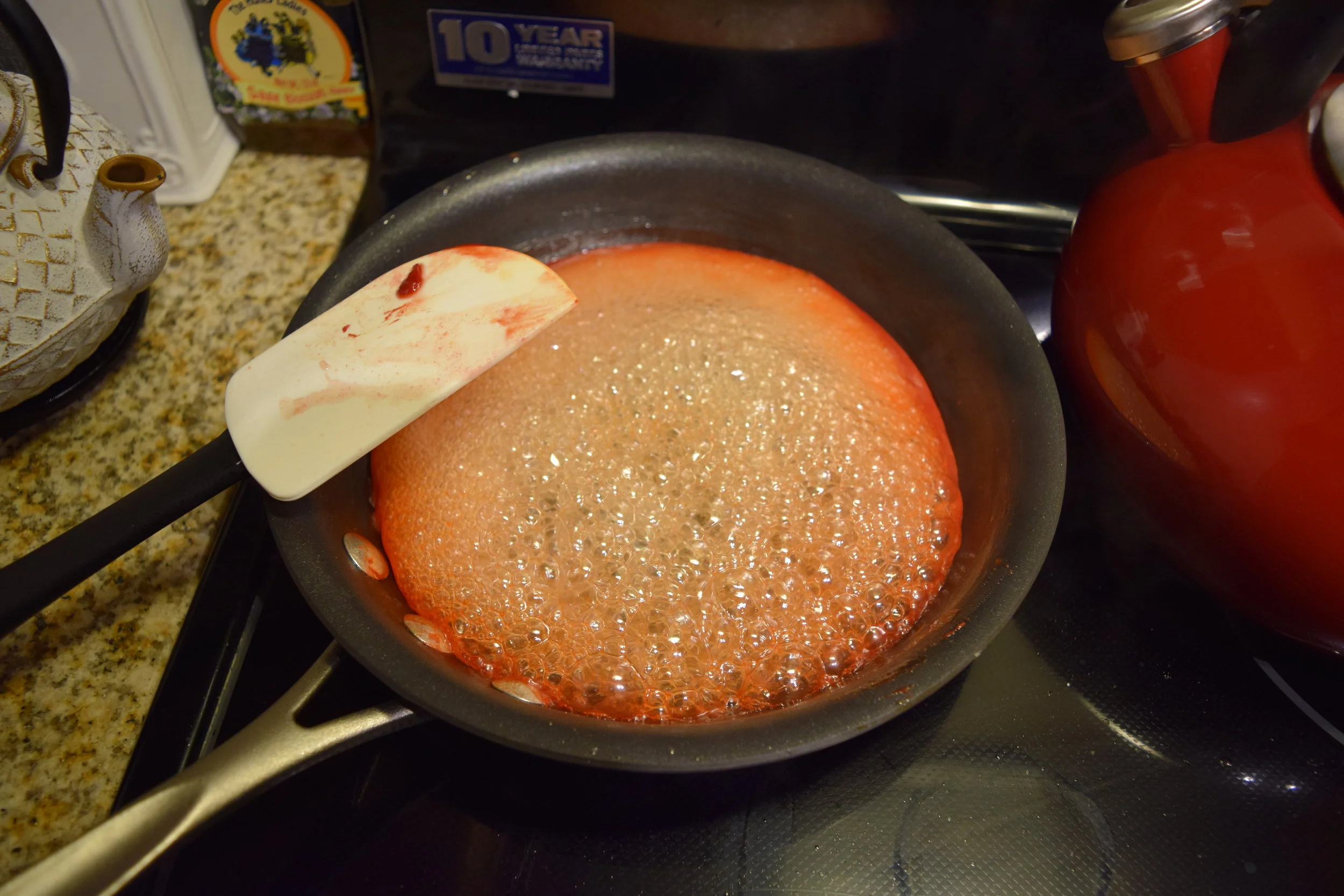 The syrup is bubbling and coming together. The kitchen smelled like awfully like cooked melon and I realized that the caramels would not end up tasting like watermelon at all.
