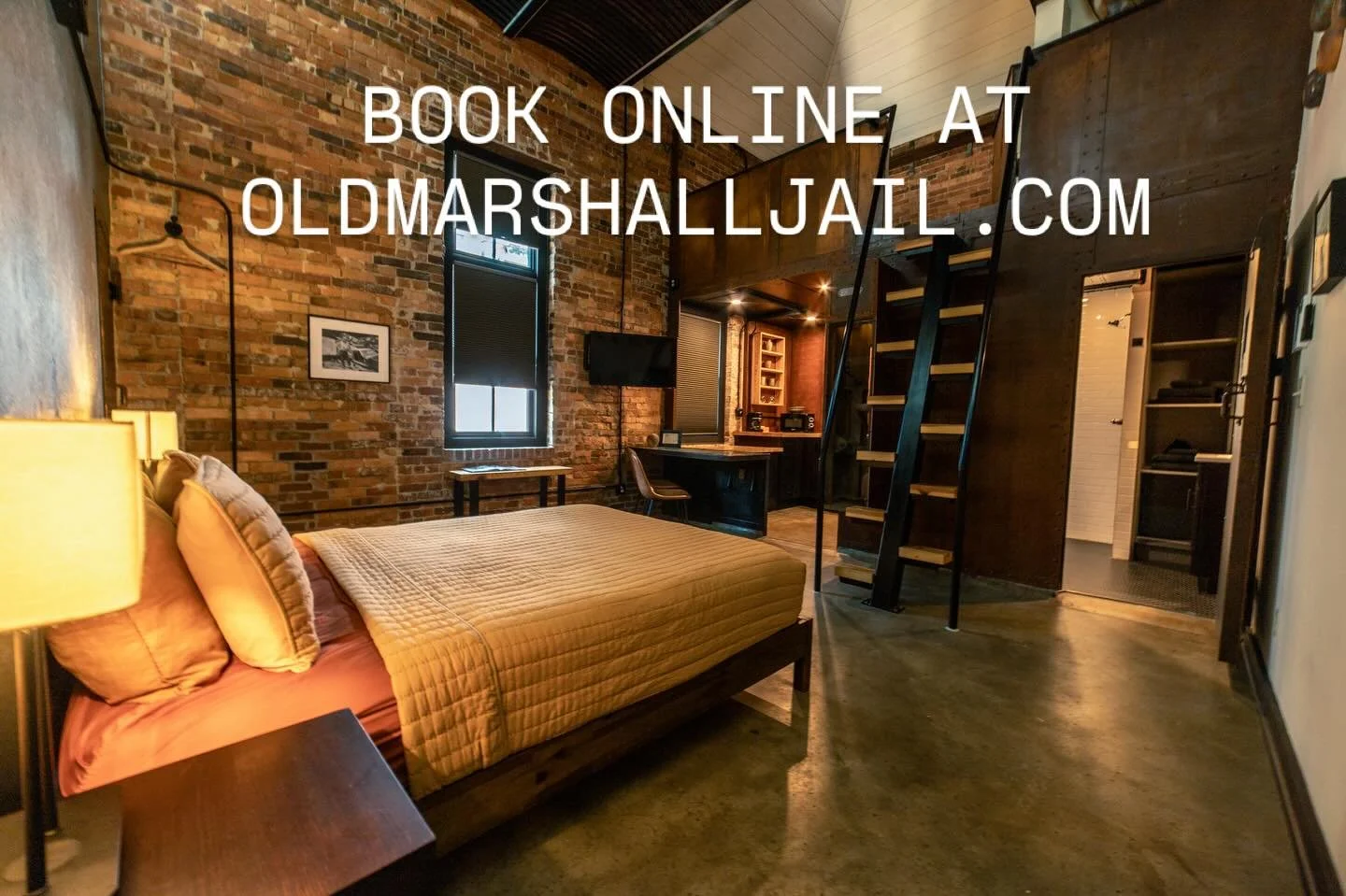 Our Loft Suites are incredibly unique, featuring a split floor plan and historic details weaved into the function of each room.  In the kitchen, you'll find counters that double as museum displays, beautiful handmade pottery and original door mechani