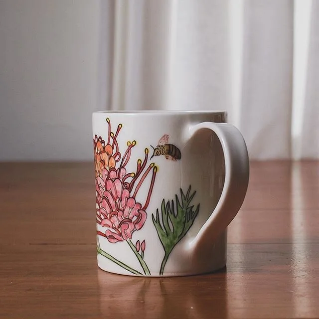 Happy World Bee Day! A day to pause and think about these awesome little creatures who have inspired my work so much lately. 🐝
Pictured on this mug is a #teddybearbee - a native Australian bee, THE cutest thing you'll ever see, about to drink some g