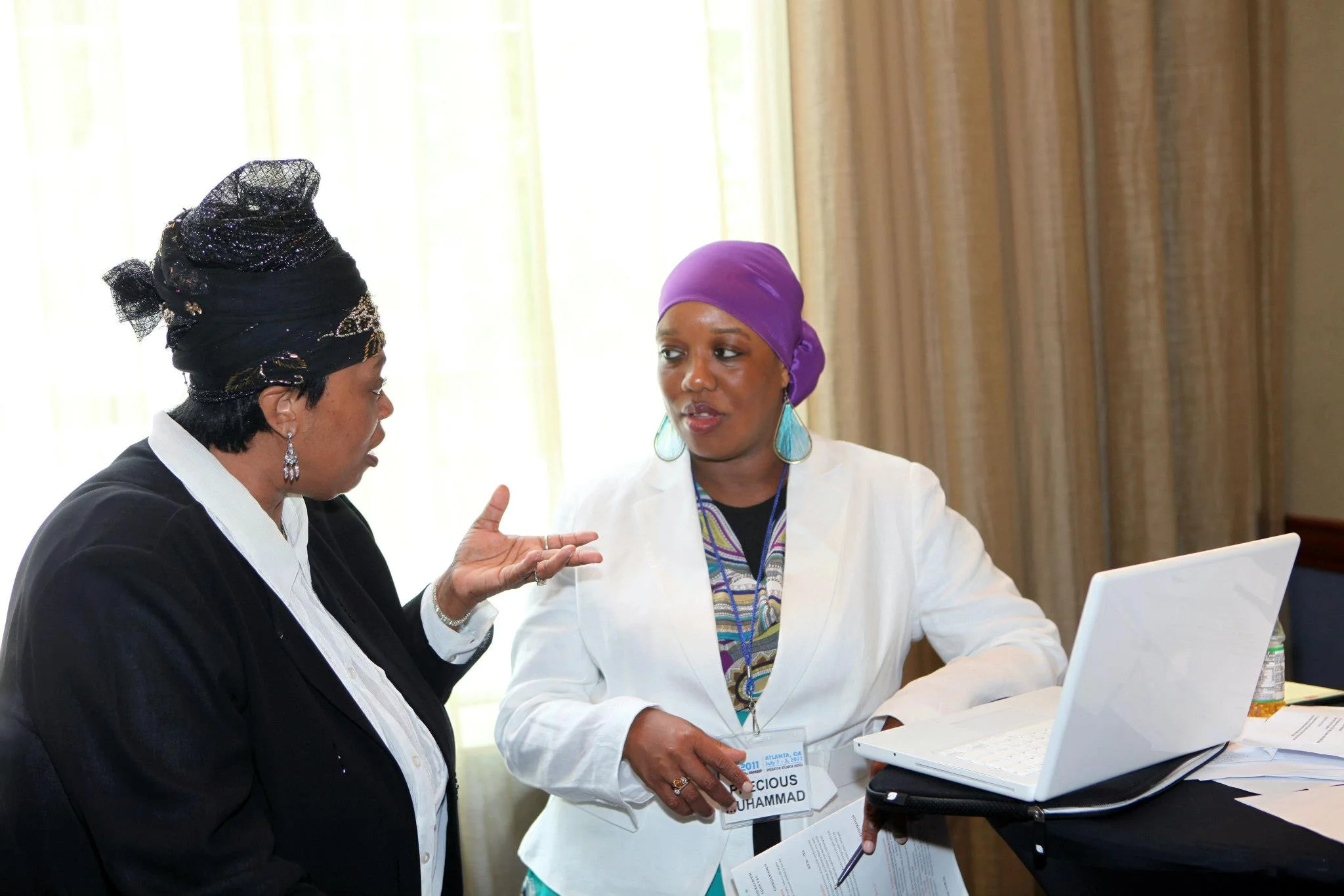 Precious discussing program plans with renowned singer Su'ad El-Amin, nationally known for her message music . This photo was taken during the 2011 Community Life Forward conference, planned by a multi-generational, all volunteer team of African American Muslims from across the country.
