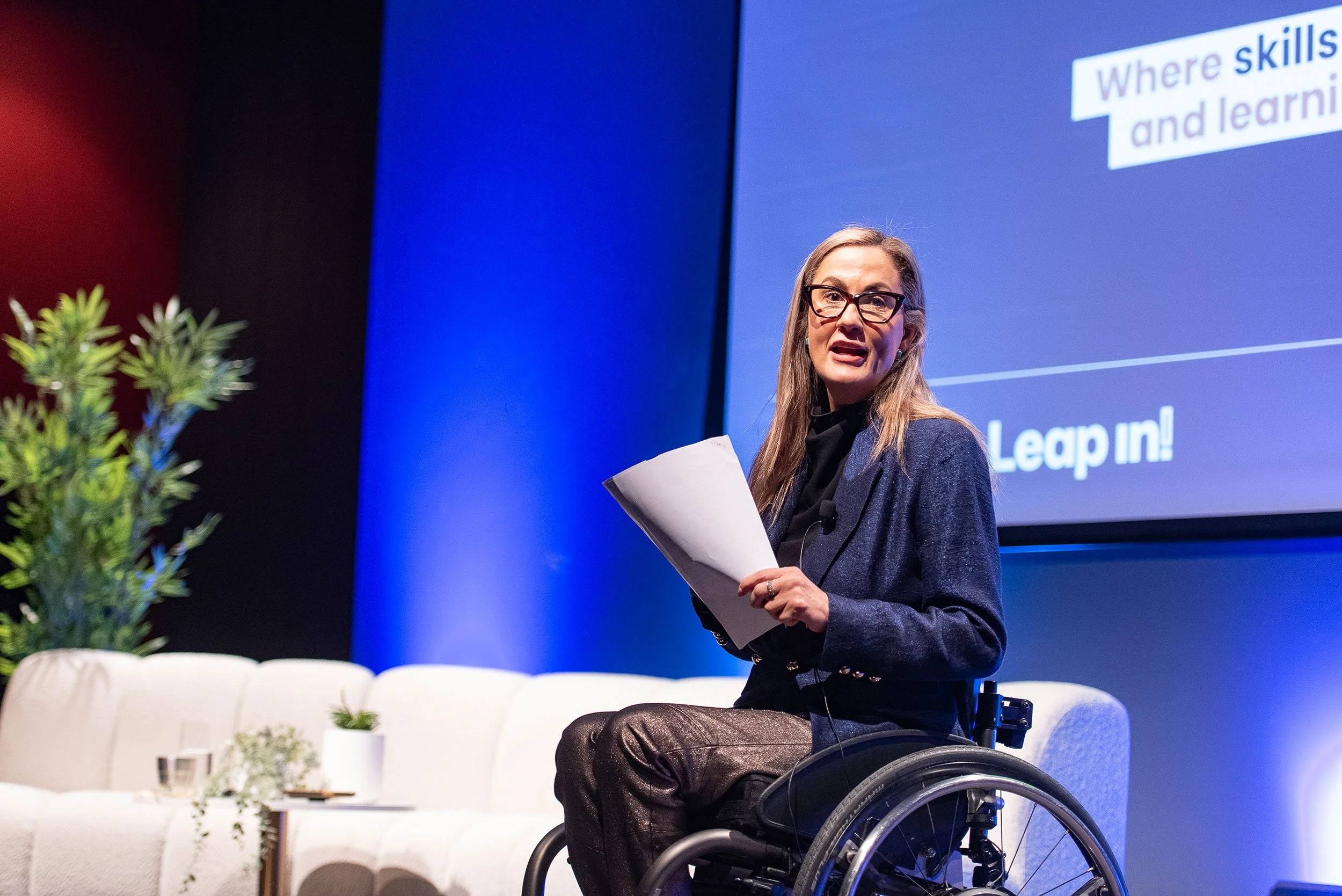 Conference speaker presenting on stage at MCEC Melbourne
