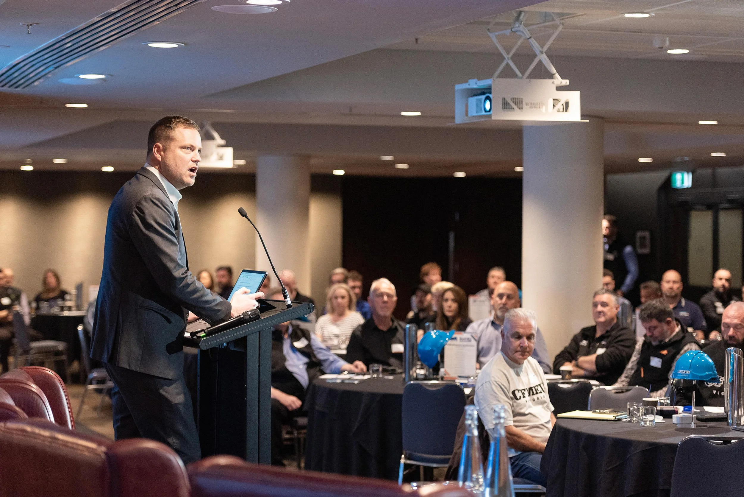 A speaker addresses seated delegates at Incolink’s 2026 Bluehats Conference at InterContinental Melbourne The Rialto.