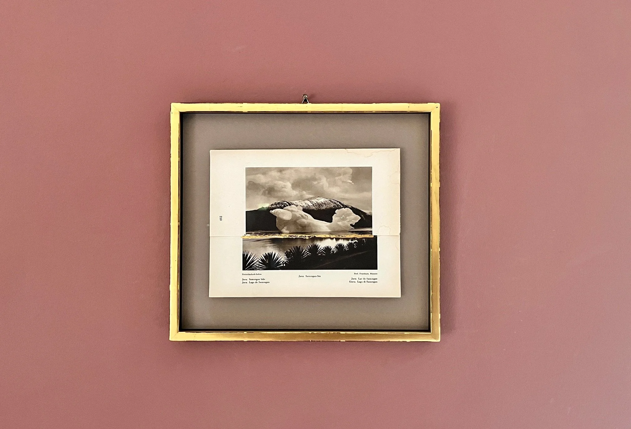  One of the collage pieces of the series ‘The Faraway World’ framed (30 x 27 cm)  in museum glass with 24 k gold leaf applied on the wooden frame 