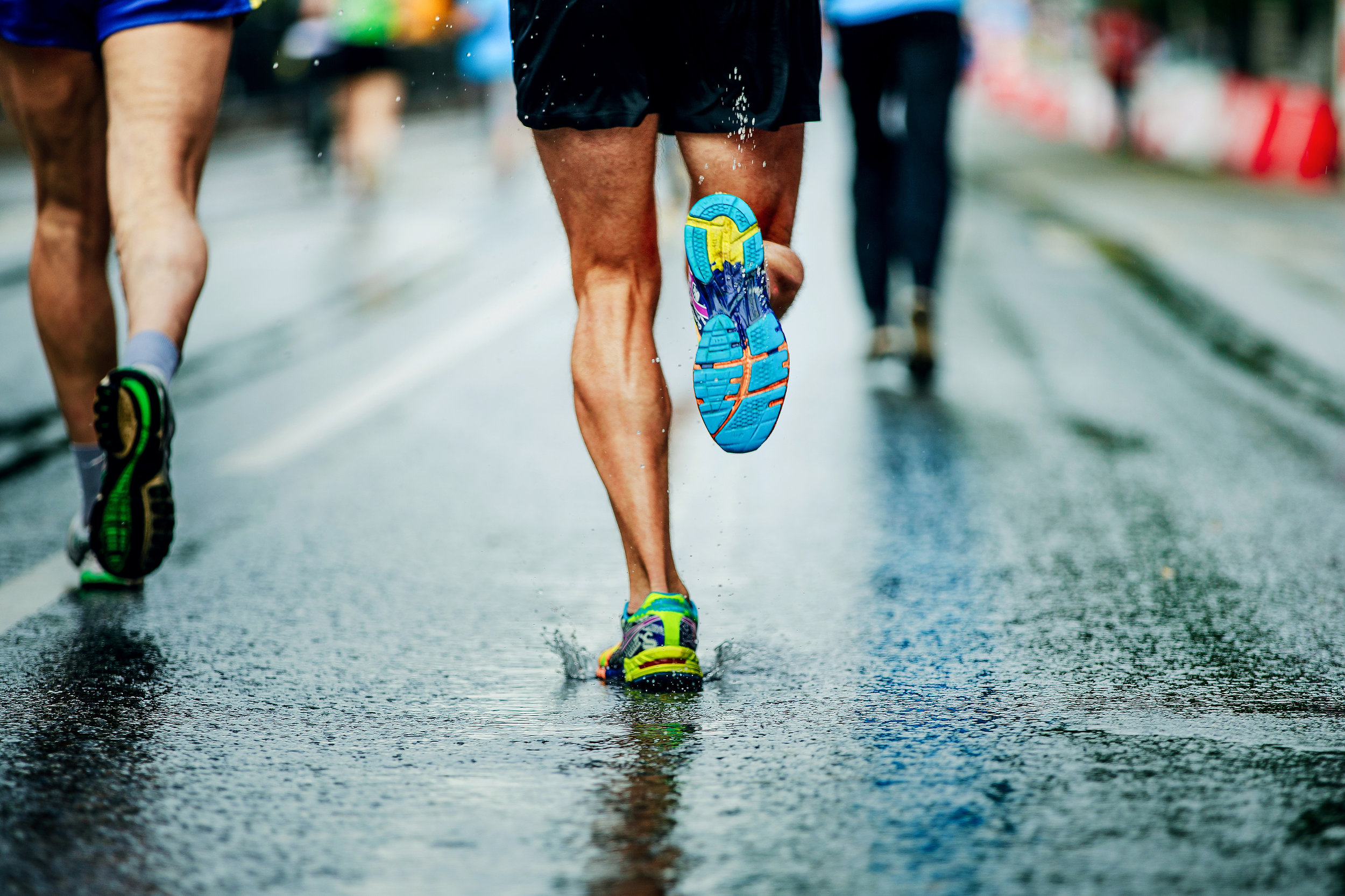 running in rain on pavement.jpeg