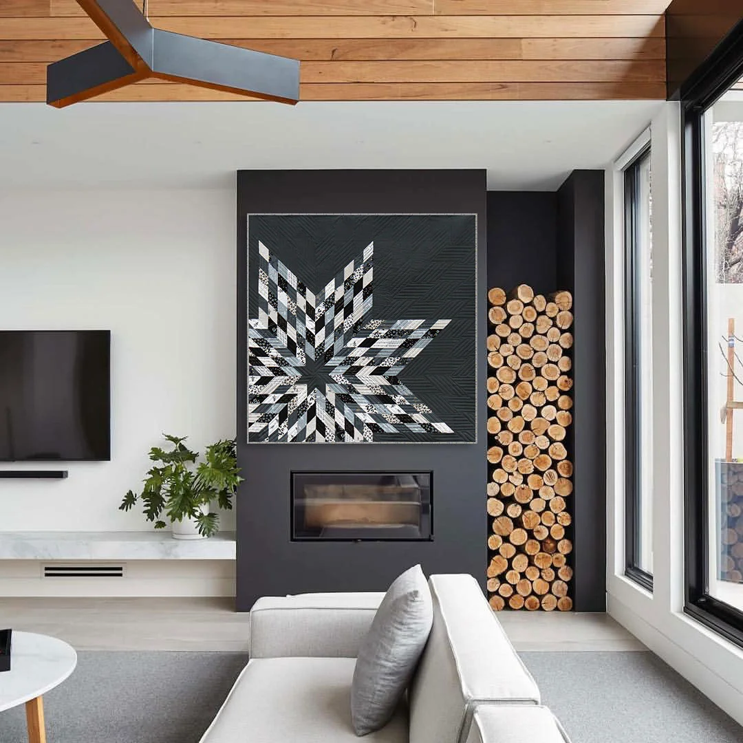 Christmas Quilt Mega Star by Zen Chic makes for a perfect fireplace decoration. Picture courtesy of integrohomes.