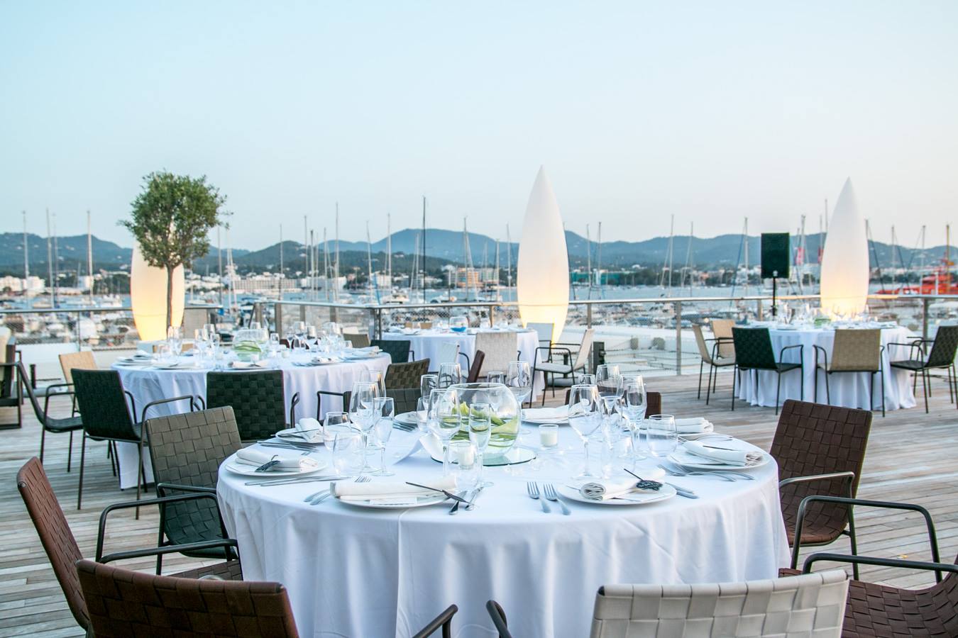 Wedding reception dinner at sunset, Es Nautic, San Antonio Ibiza. Photo by Dario Sanz.