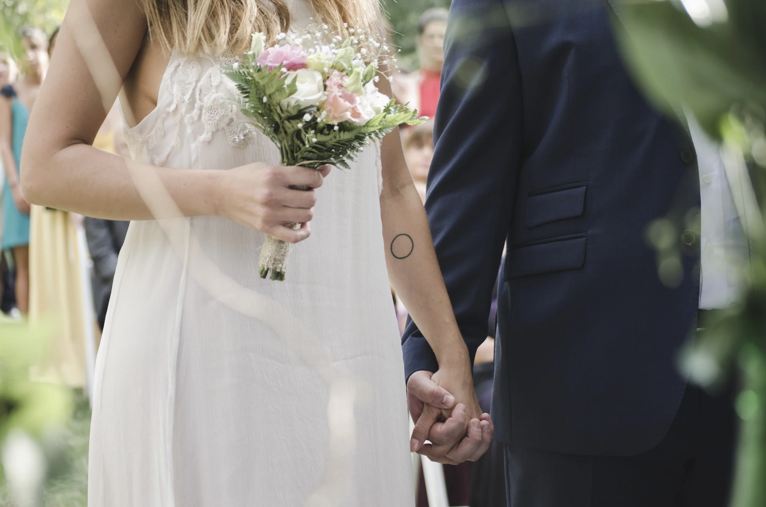 Bride and Groom holding hands