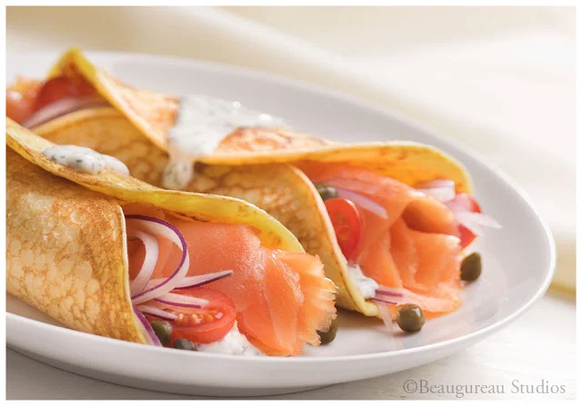 Ricotta cheese provides an unexpected tenderness to smoked Salmon-filled Crepes.