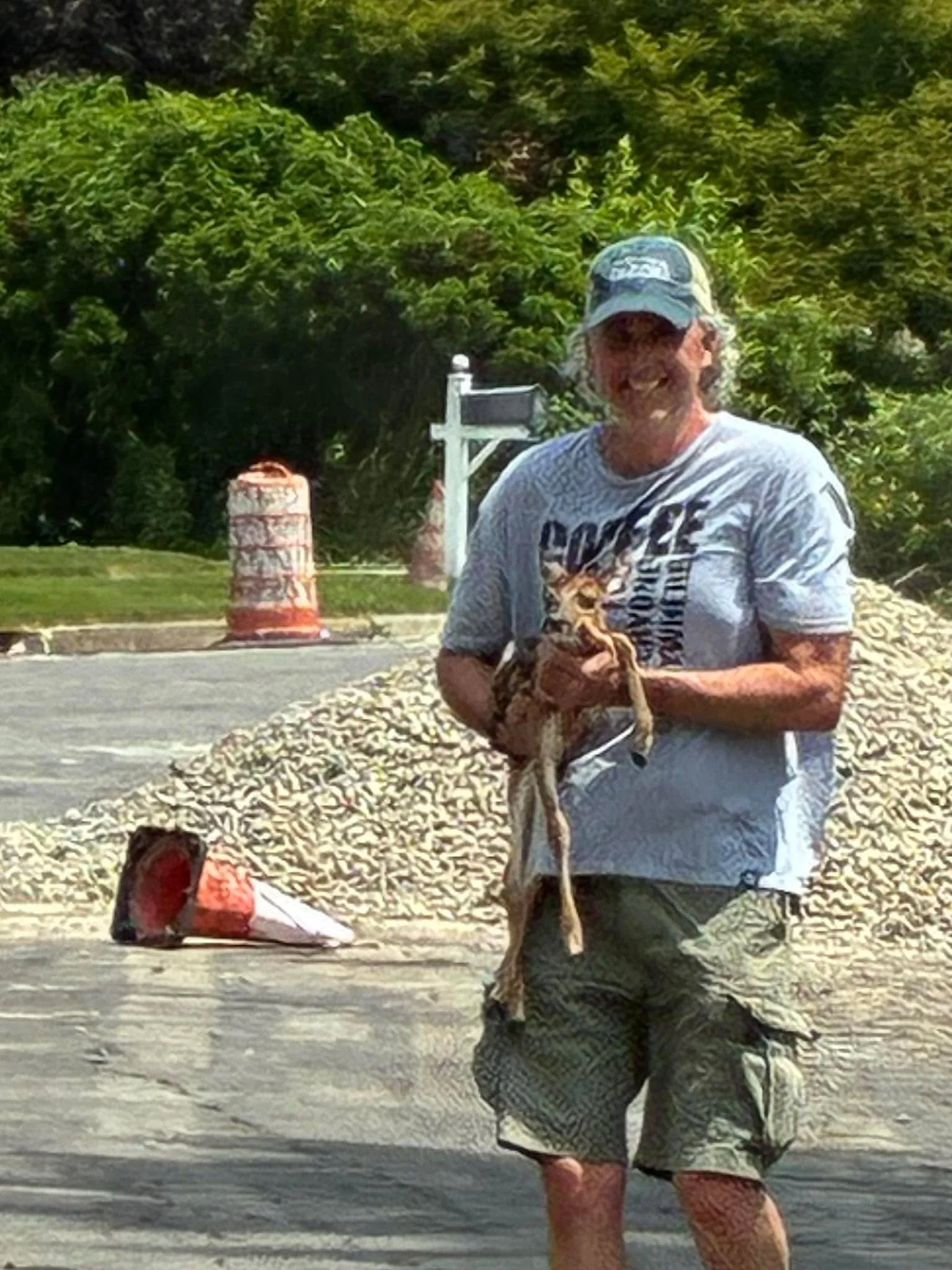 A different kind of day. Trying to unit two fawns with their mother born last night in my neighbors fenced in yard.