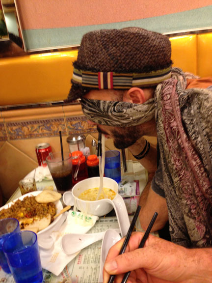 My first night in Hong Kong and I almost get hot sauce in my eye. luck it went in my right, But we decided it was best I eat like this. - Hong Kong