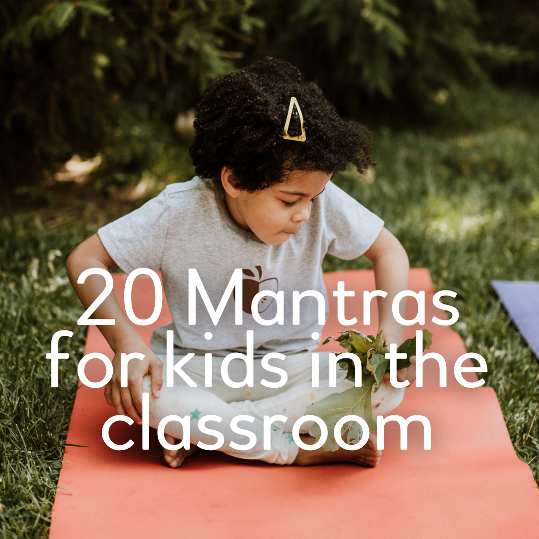 A child sits on an orange yoga mat outside on grass with the words '20 Mantras for kids in the classroom' superimposed