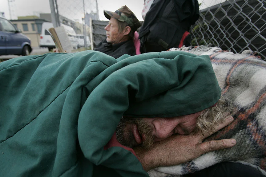 Brothers Bruce and Ed, both veterans, take turns sleeping and posting watch.