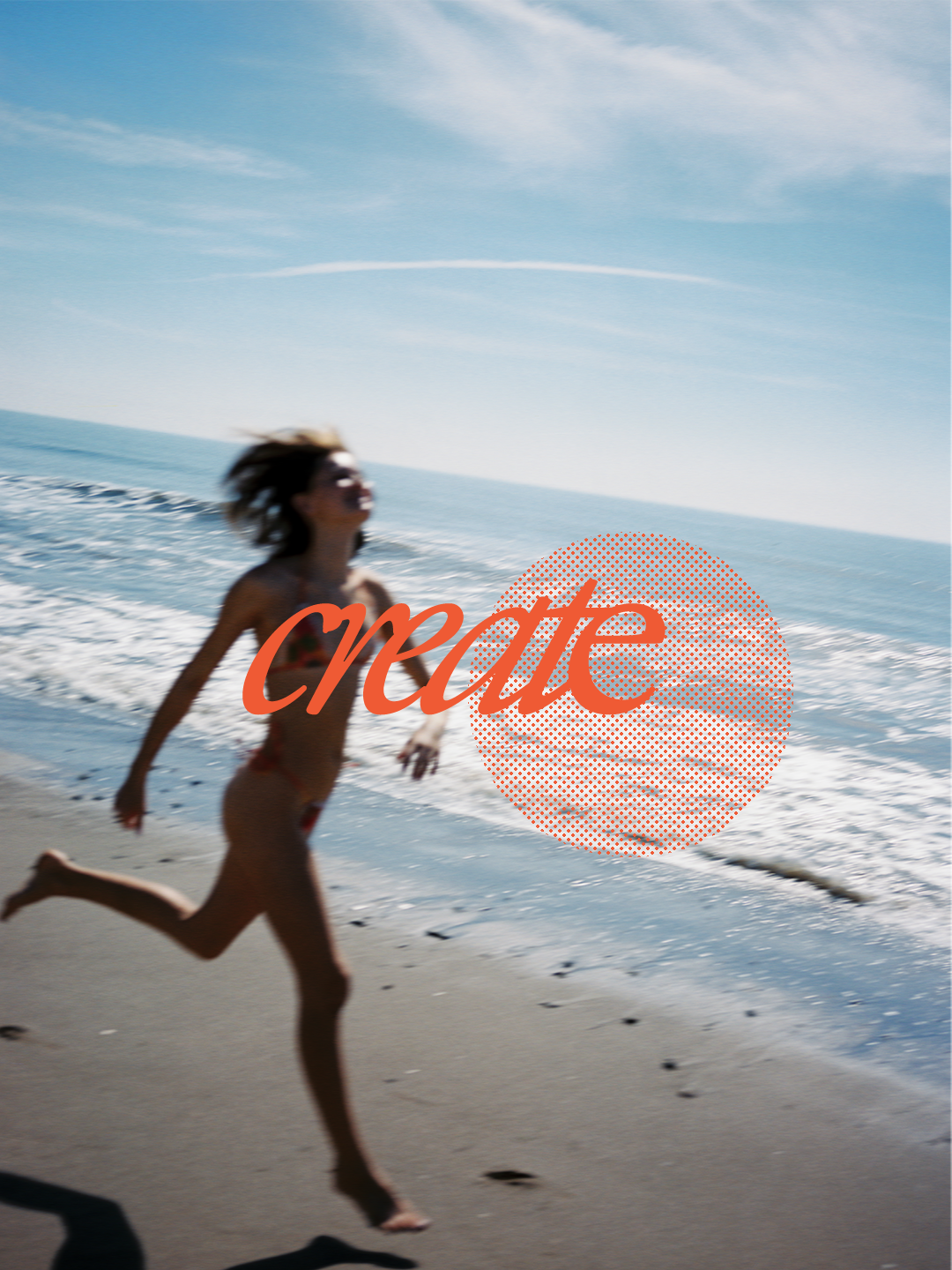 Blurry photo of a woman running on the beach near the ocean with the word "create" overlaid in orange text.
